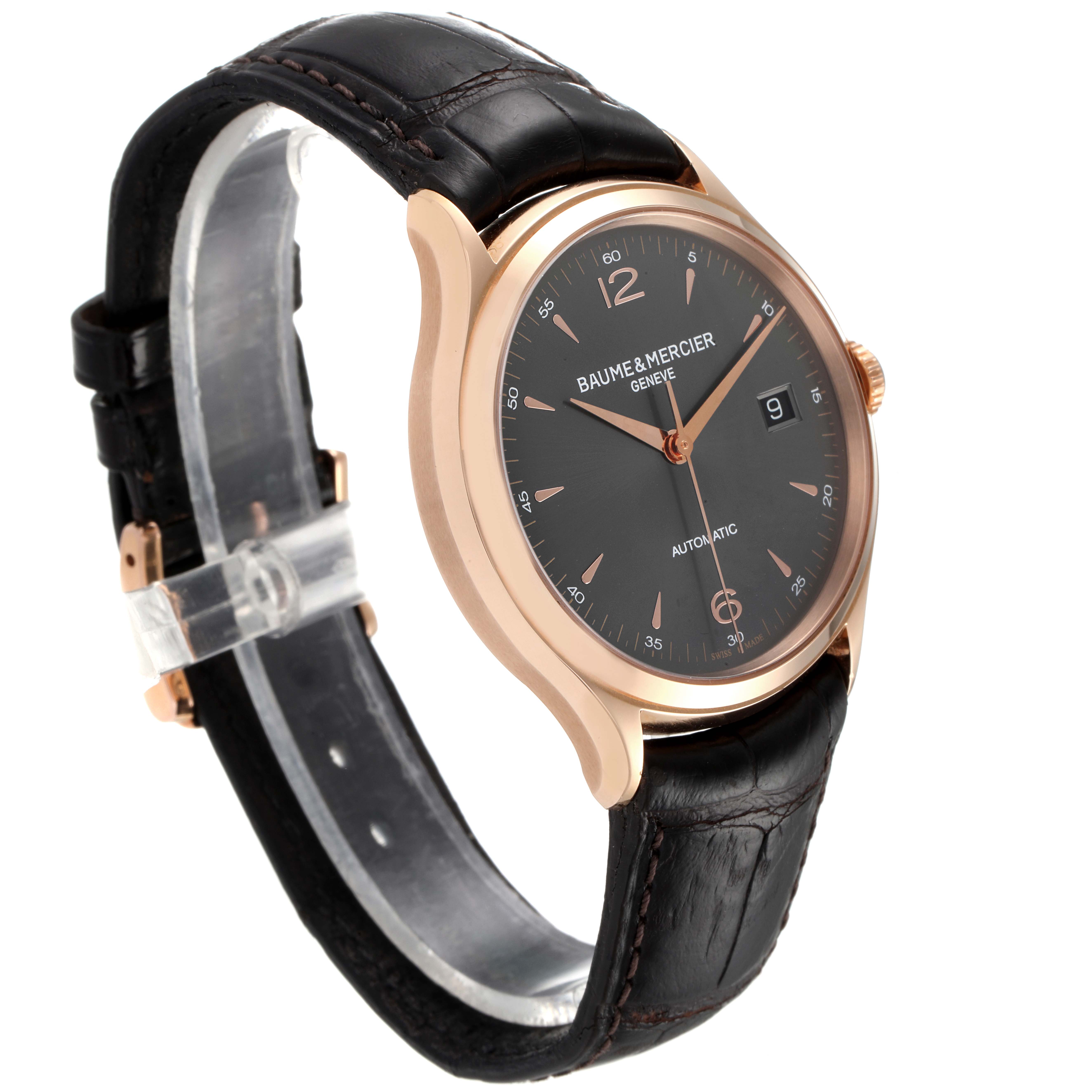 The Baume & Mercier Clifton M0A10059 Men's Rose Gold Grey Dial M0A10059 Men's Rose Gold Grey Dial watch is shown from a left side angle, highlighting its dial, case, and leather strap.
