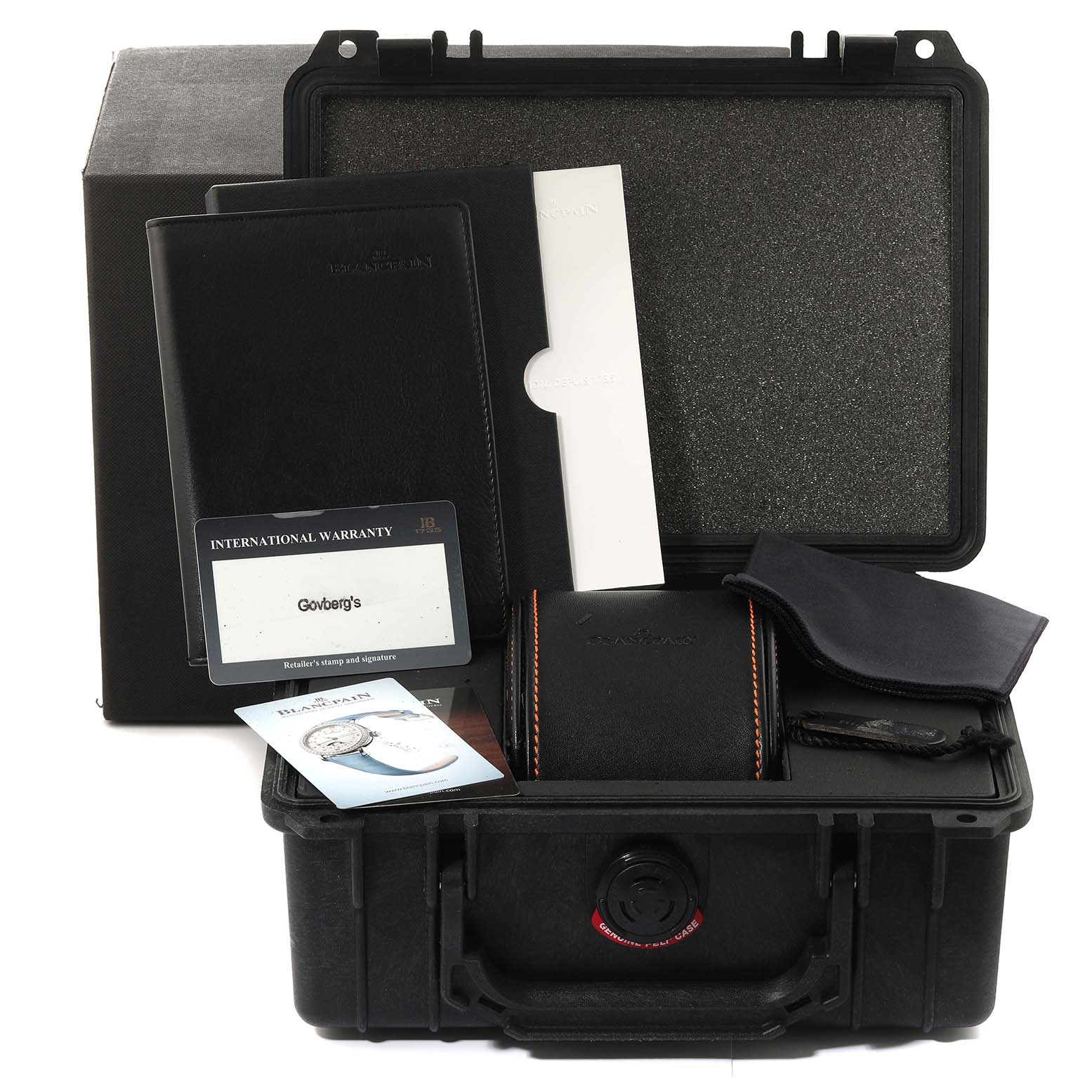 The image shows the accessories for a Blancpain Fifty Fathoms 5785F-11D03-63A Men's Stainless Steel Black Dial 5785F-11D03-63A Men's Stainless Steel Black Dial watch, including a carrying case, warranty card, manual, and additional documentation.