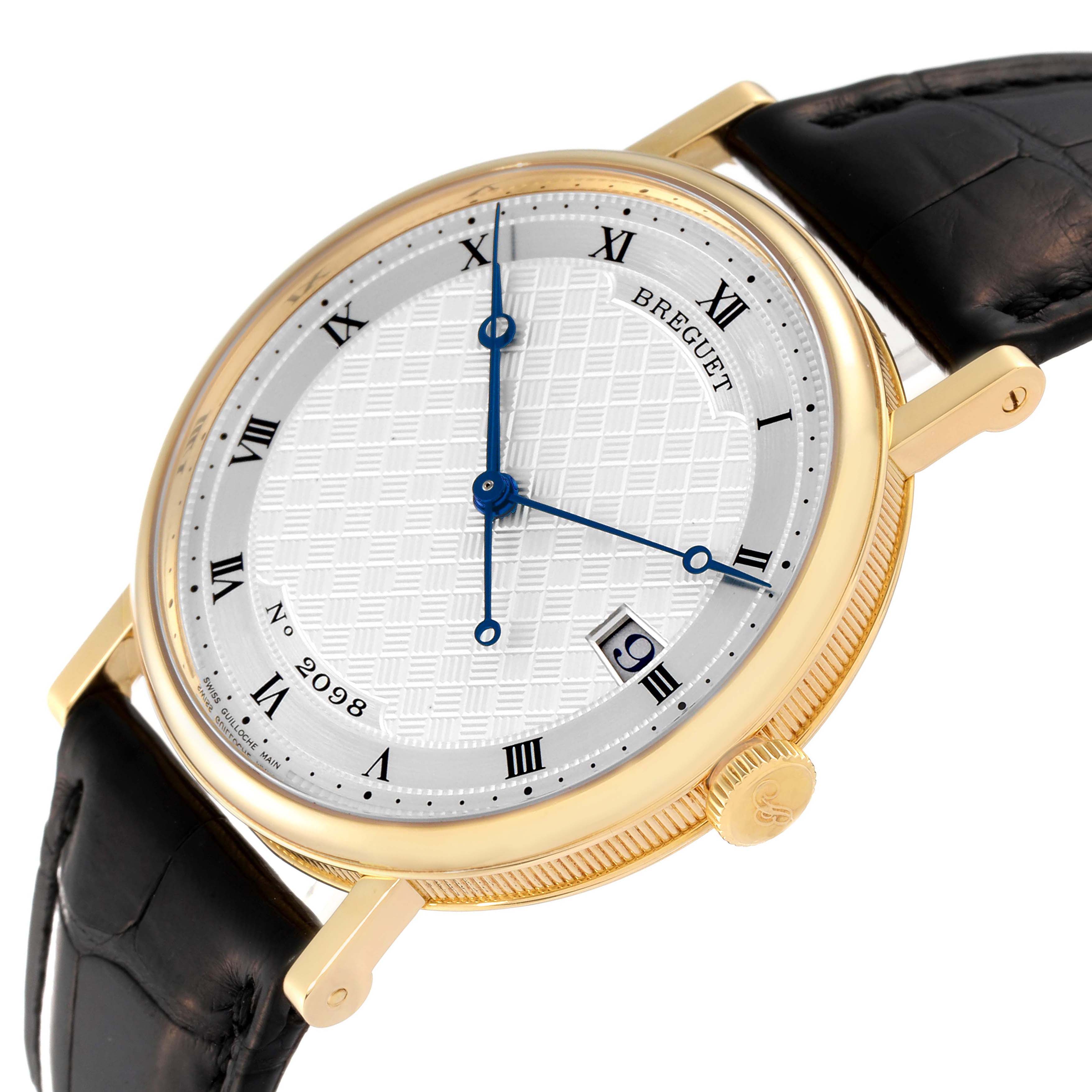 This image shows the Breguet Classique 5177BA/12/9V6 Men's Yellow Gold Silver Dial 5177BA/12/9V6 Men's Yellow Gold Silver Dial watch at a slight angle, highlighting the dial, case, crown, and watch strap.