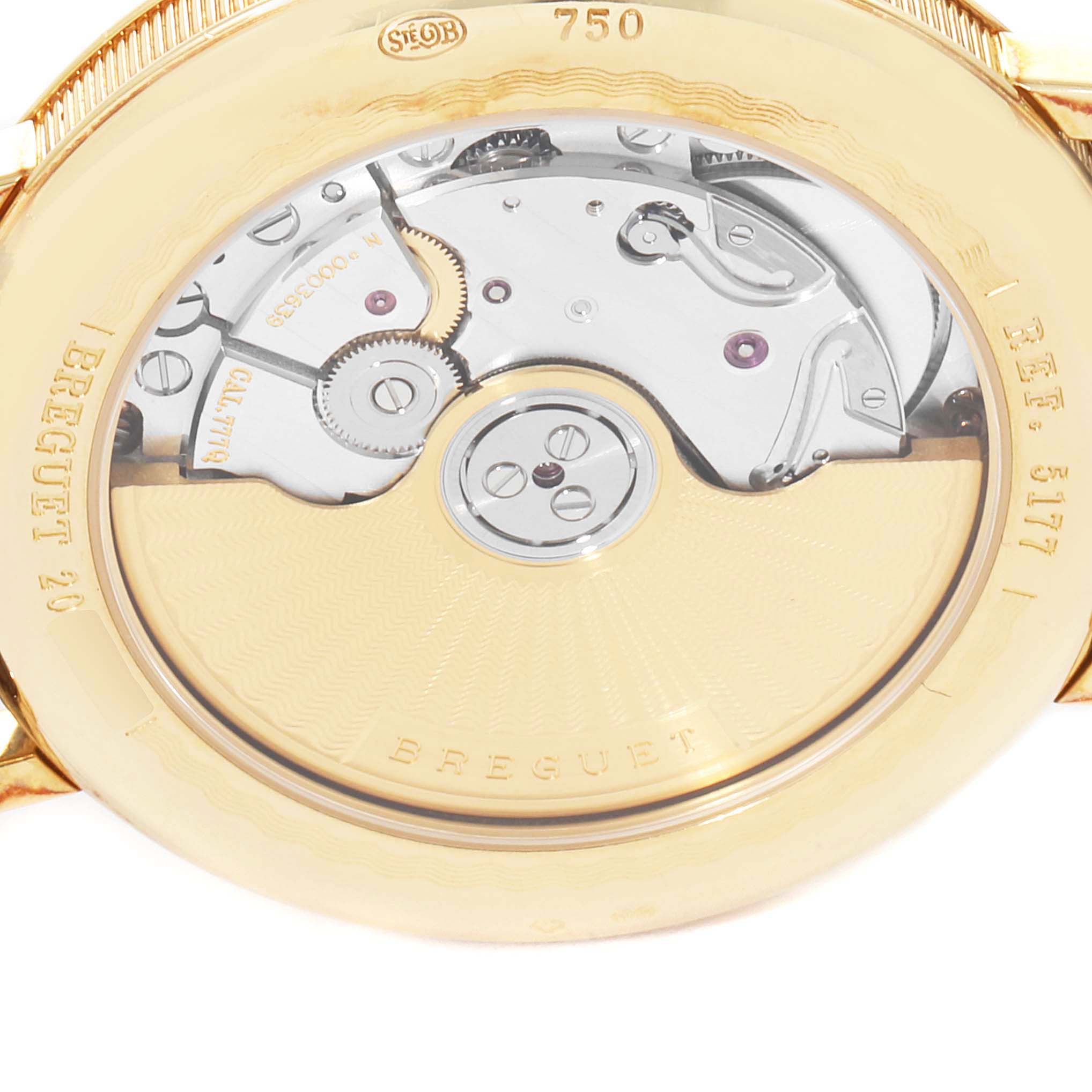 The image shows the back view of the movement and rotor inside the Breguet Classique 5177BA/12/9V6 Men's Yellow Gold Silver Dial 5177BA/12/9V6 Men's Yellow Gold Silver Dial watch model.