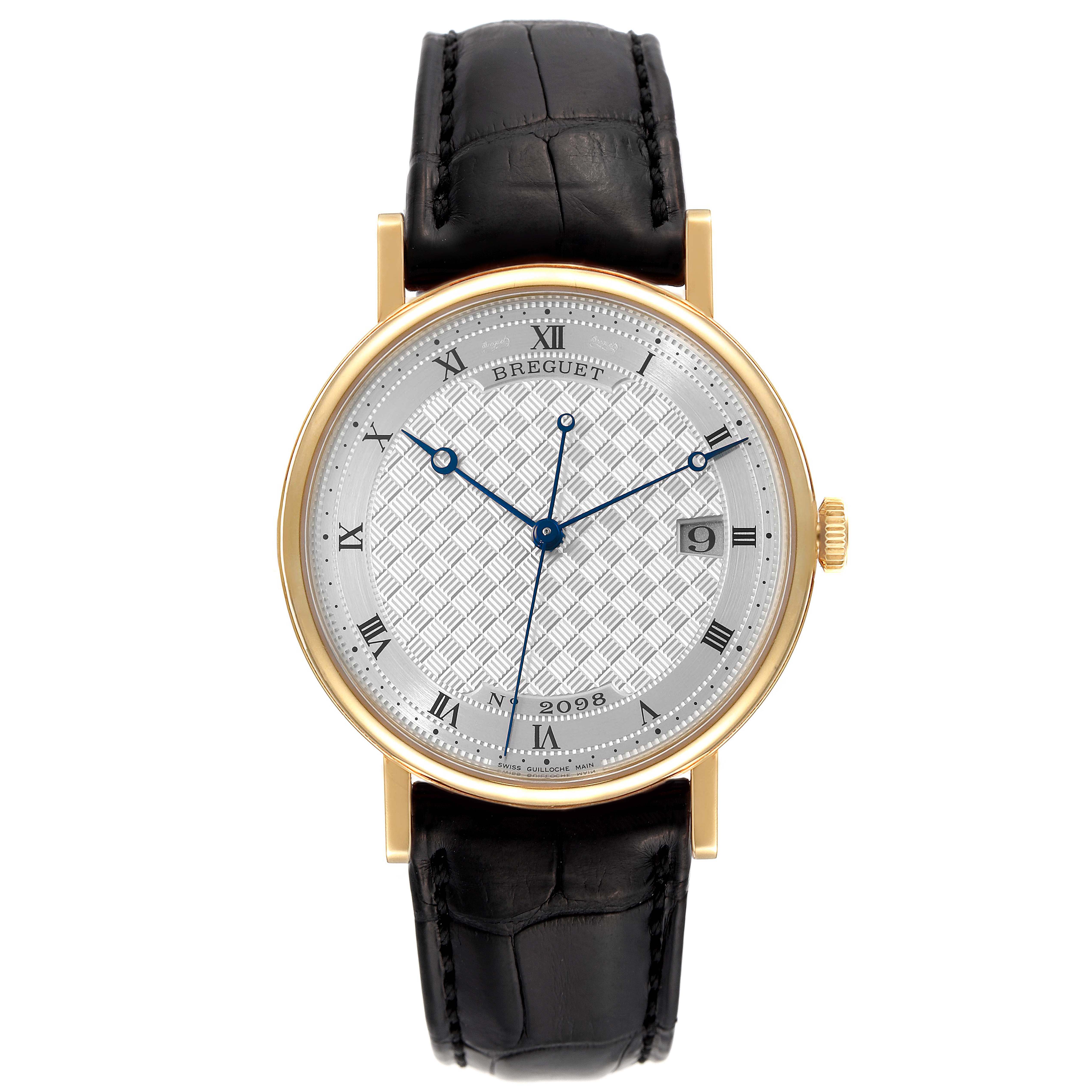 The Breguet Classique 5177BA/12/9V6 Men's Yellow Gold Silver Dial 5177BA/12/9V6 Men's Yellow Gold Silver Dial model watch is shown from a front angle, displaying the dial, hands, and leather strap.