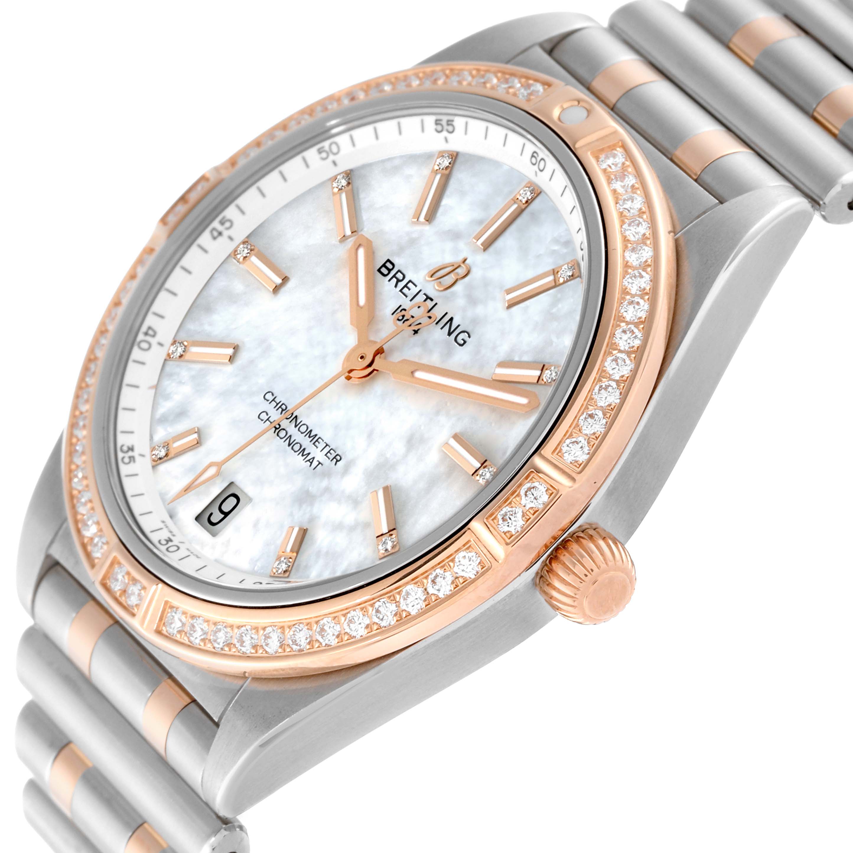 The image shows an angled close-up of the Breitling U10380591A2U1 Women's Steel and Gold (two tone) Mother of Pearl Dial U10380591A2U1 Women's Steel and Gold (two tone) Mother of Pearl Dial Chronomat 36 U10380 watch, highlighting its mother of pearl diamond dial, steel and rose gold case, and bracelet.