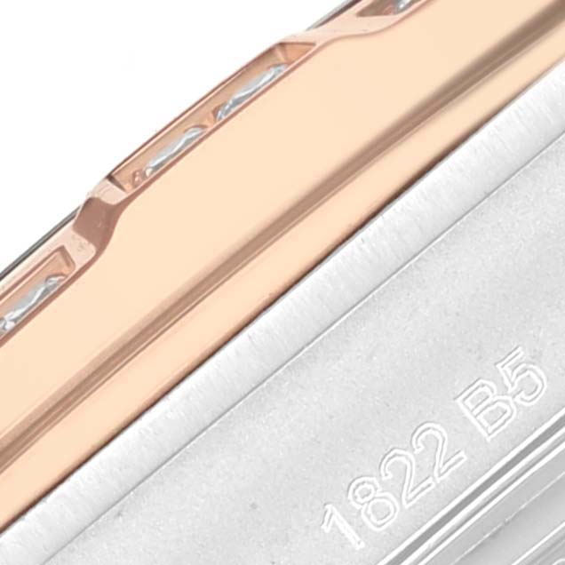 This close-up angle shows the bezel and part of the case of the Breitling U10380591A2U1 Women's Steel and Gold (two tone) Mother of Pearl Dial U10380591A2U1 Women's Steel and Gold (two tone) Mother of Pearl Dial Chronomat 36 Mother Of Pearl Diamond Dial Steel Rose Gold Ladies Watch U10380.