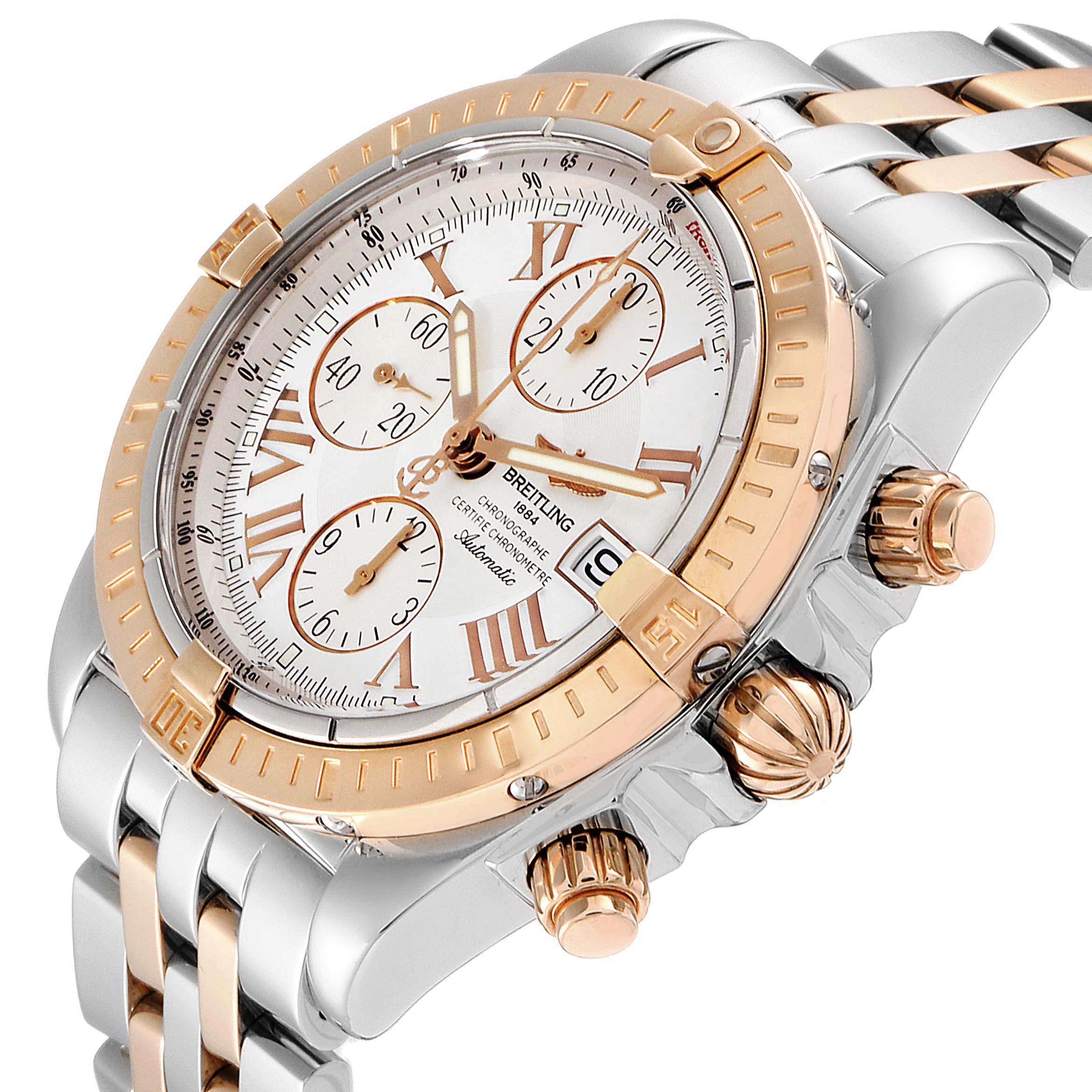The Breitling Chronomat C13356 Men's Steel and Gold (two tone) White Dial C13356 Men's Steel and Gold (two tone) White Dial watch is shown at an angle showcasing its face, crown, and chronograph pushers.