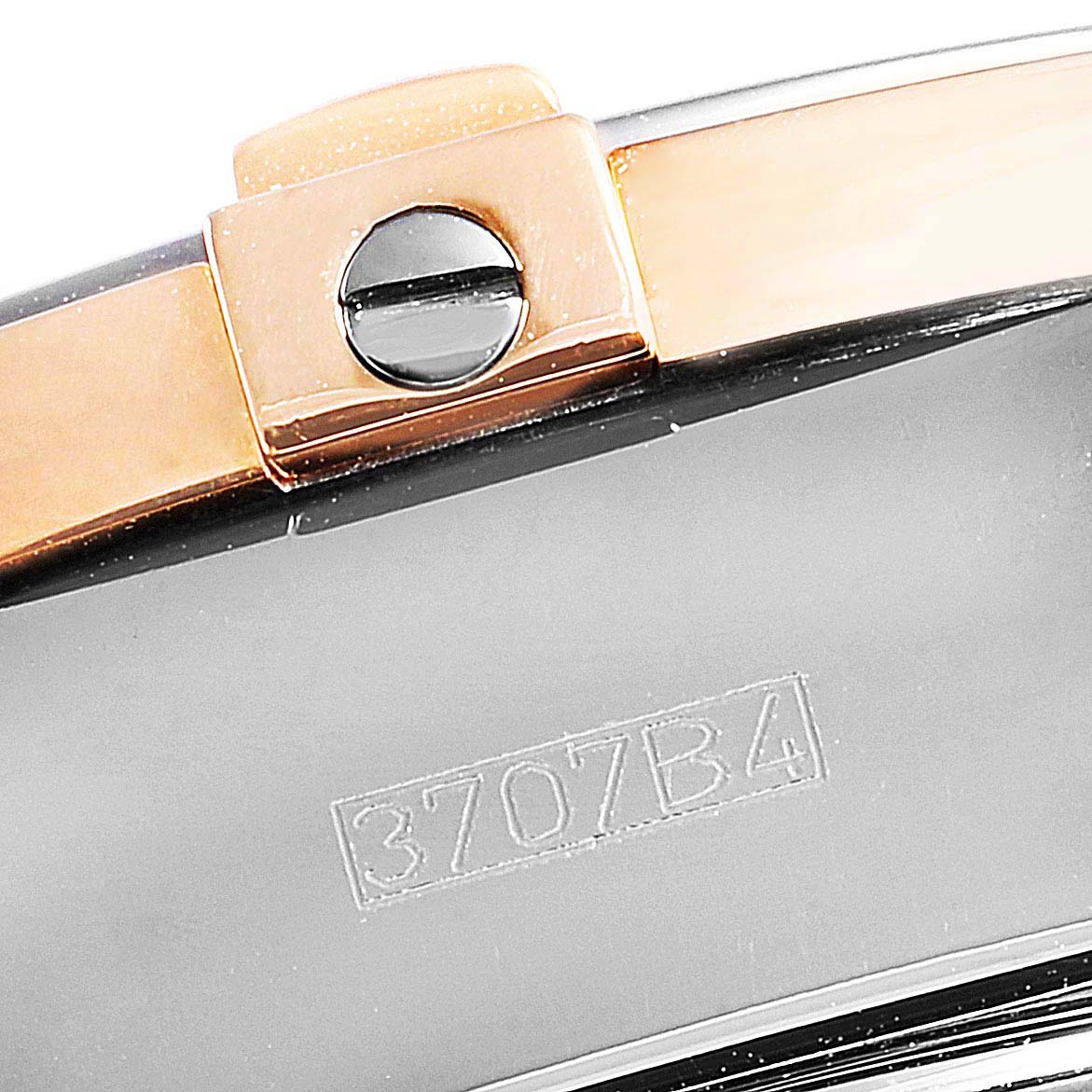 The image shows a close-up of the case and bracelet with a screw of a Breitling Chronomat C13356 Men's Steel and Gold (two tone) White Dial C13356 Men's Steel and Gold (two tone) White Dial watch.