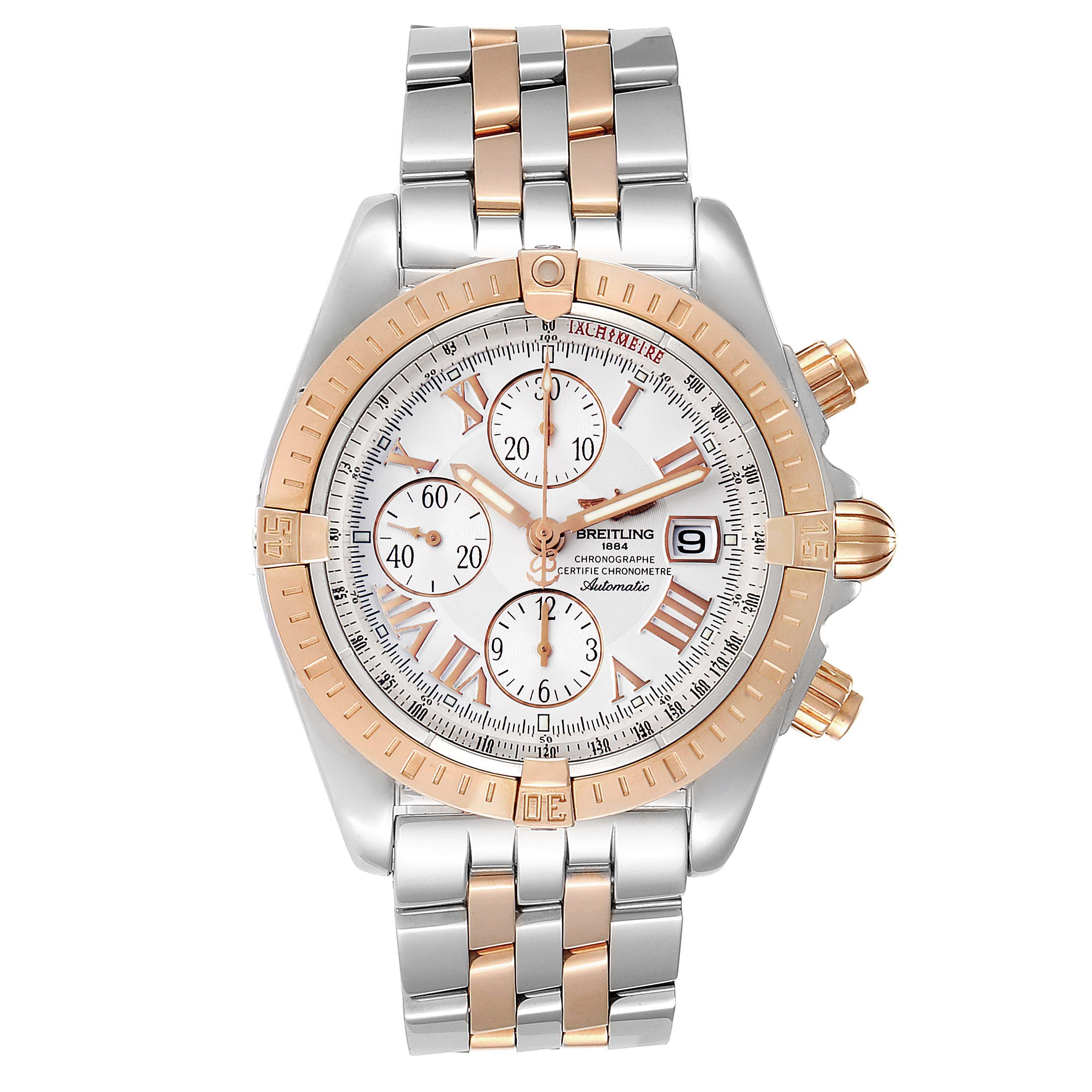 The Breitling Chronomat C13356 Men's Steel and Gold (two tone) White Dial C13356 Men's Steel and Gold (two tone) White Dial watch is shown from a front angle, displaying its dial, bezel, and bracelet.