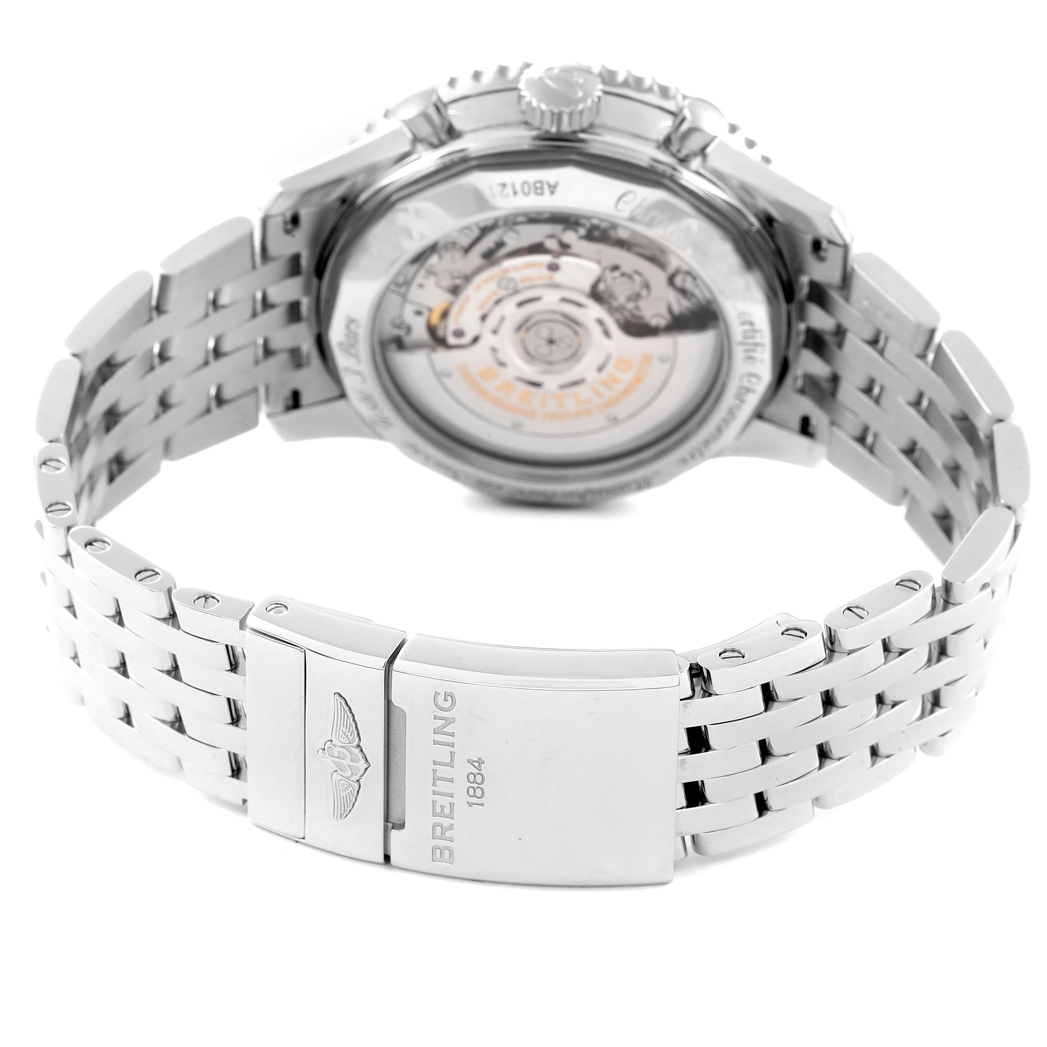 The image shows the back view of the Breitling Navitimer AB0121 Men's Stainless Steel Black Dial AB0121 Men's Stainless Steel Black Dial watch, highlighting the movement and bracelet clasp.