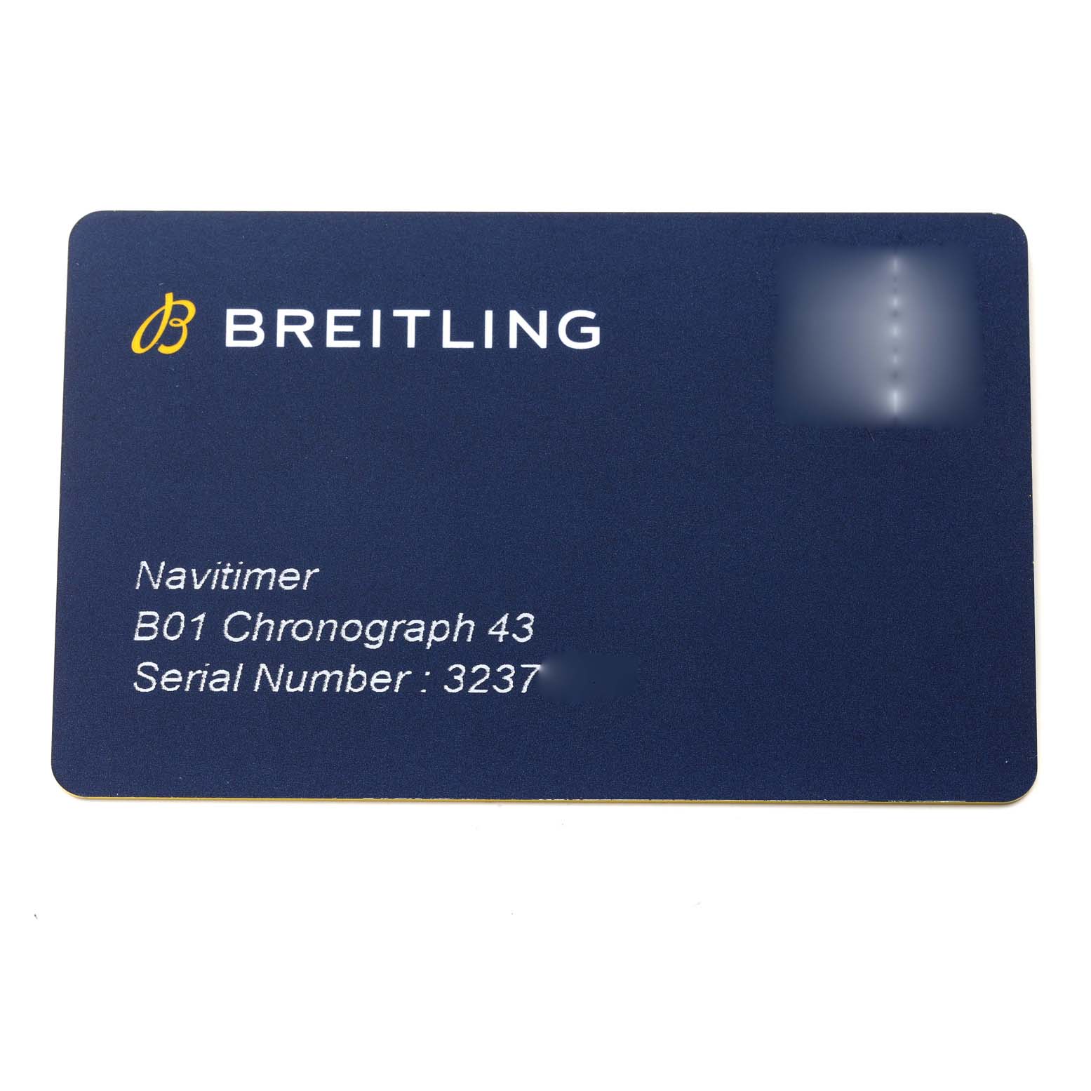 The image shows a Breitling Navitimer AB0121 Men's Stainless Steel Black Dial AB0121 Men's Stainless Steel Black Dial B01 Chronograph 43 warranty card, displaying the model and serial number information.