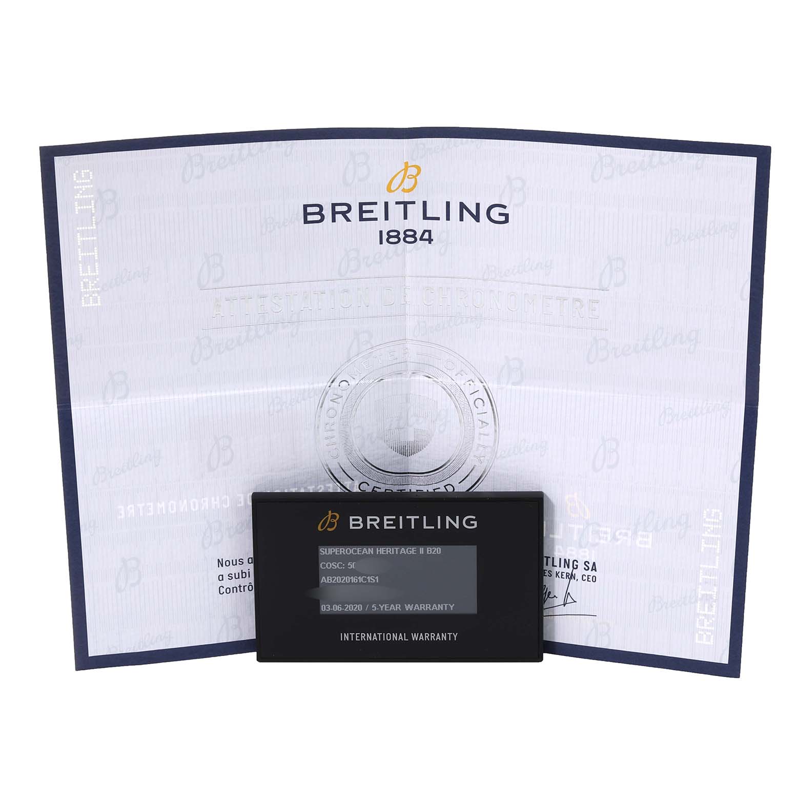 The image shows the warranty card and certificate for the Breitling Superocean AB2020 Men's Stainless Steel Blue Dial AB2020 Men's Stainless Steel Blue Dial watch model, photographed from the front.
