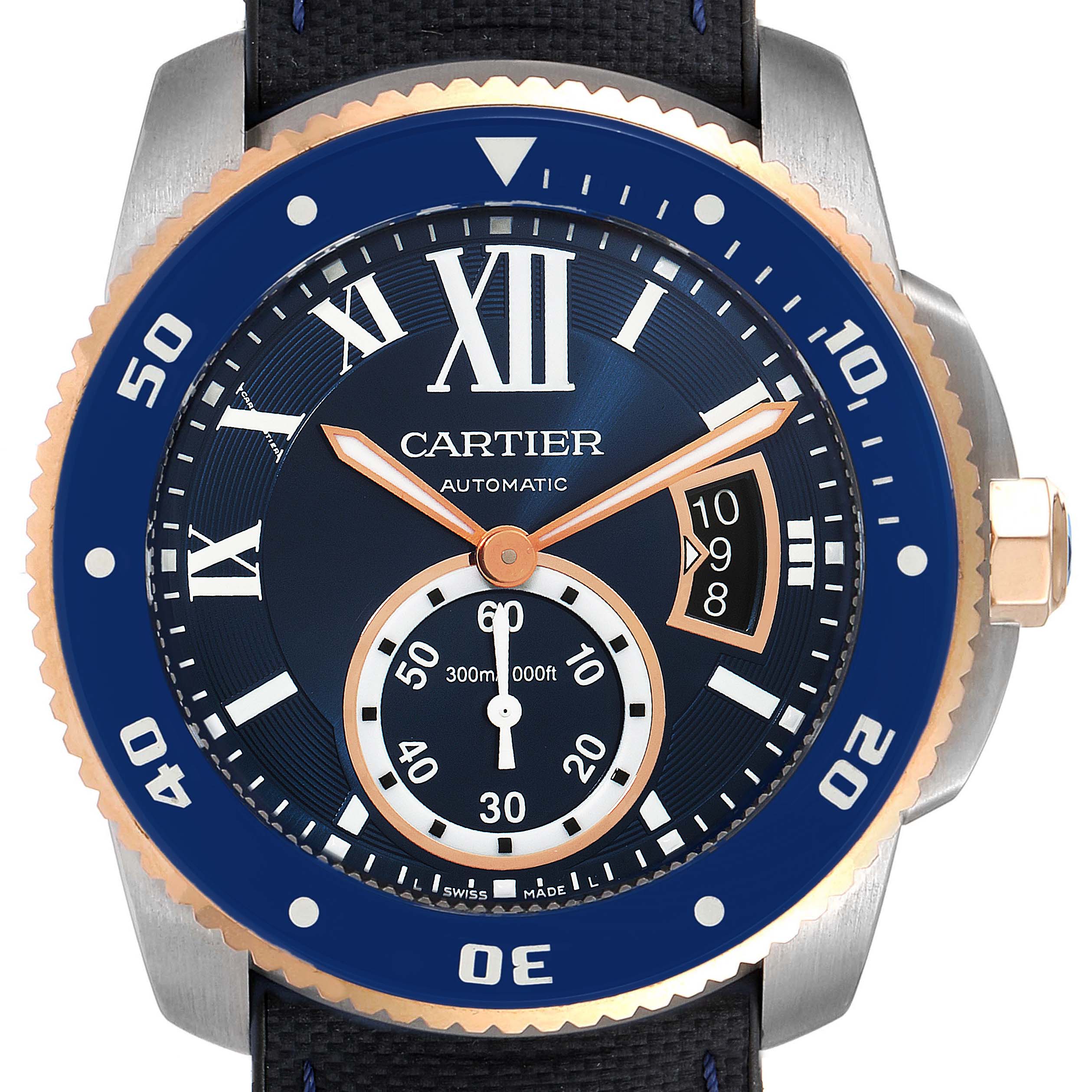 The image shows a close-up, frontal view of the Calibre de Cartier watch by Cartier, highlighting the dial, bezel, and crown.