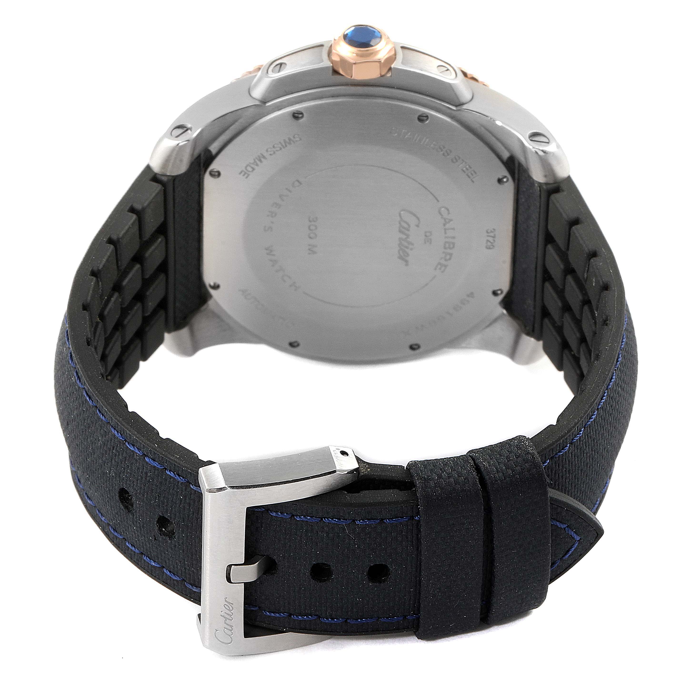 The image shows the back case and strap of a Calibre de Cartier watch by Cartier, viewed from an angled rear perspective.