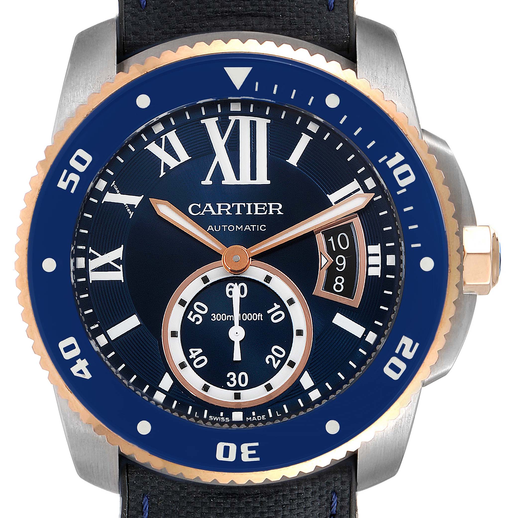 The image shows a frontal view of the Calibre de Cartier watch by Cartier, highlighting the dial, bezel, and crown.