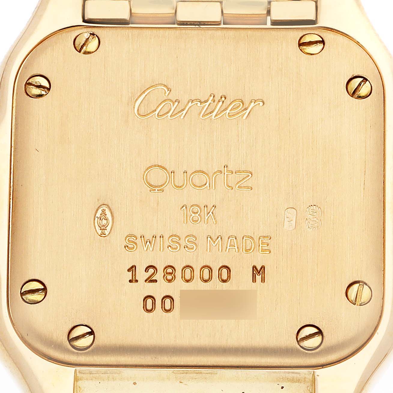 This is a close-up of the back case of a Panthere model watch by Cartier, showing engravings and screws.