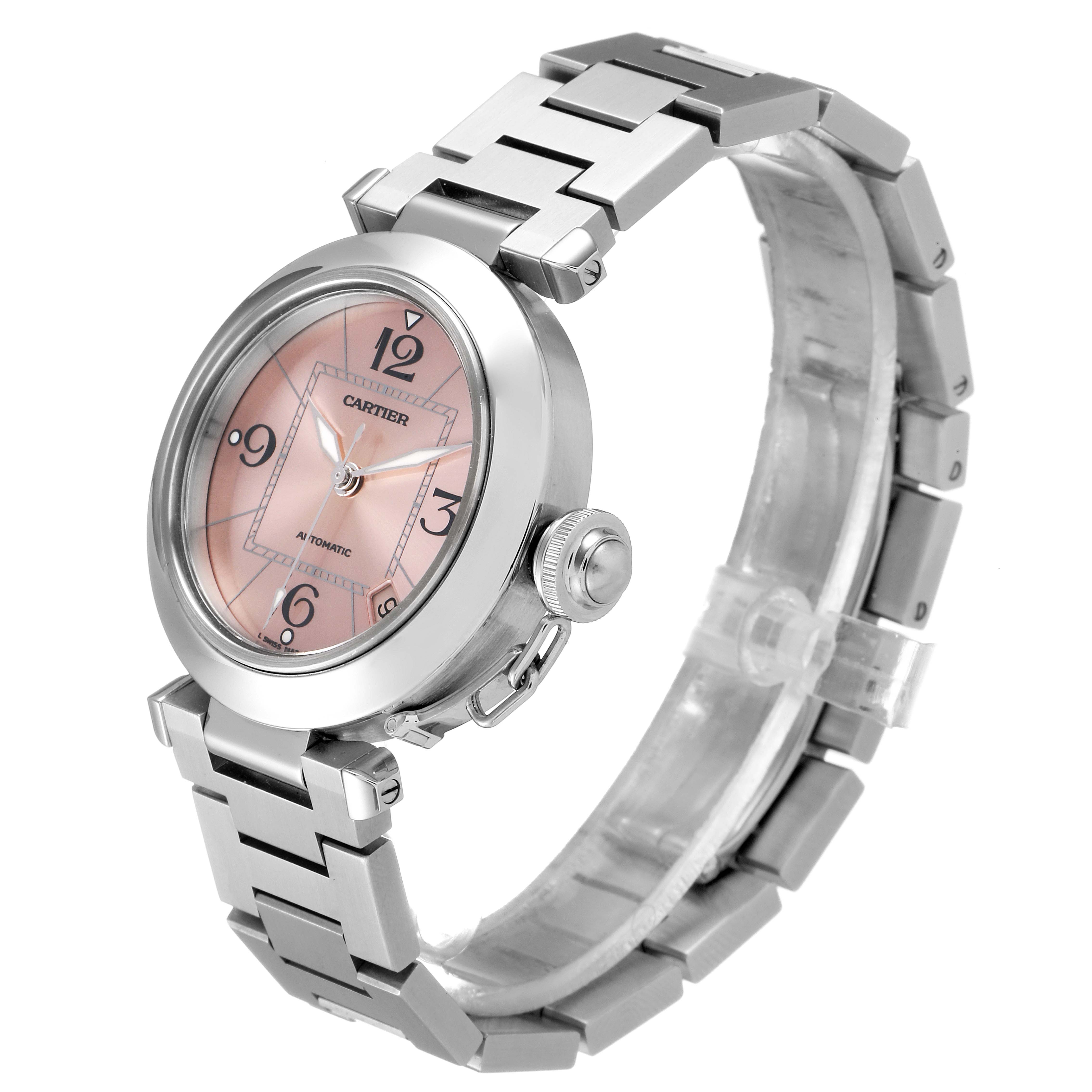 This image shows a Cartier Pasha W31075M7 Women's Stainless Steel Pink Dial W31075M7 Women's Stainless Steel Pink Dial watch from an angled side view, highlighting its round face, crown, and metal bracelet.