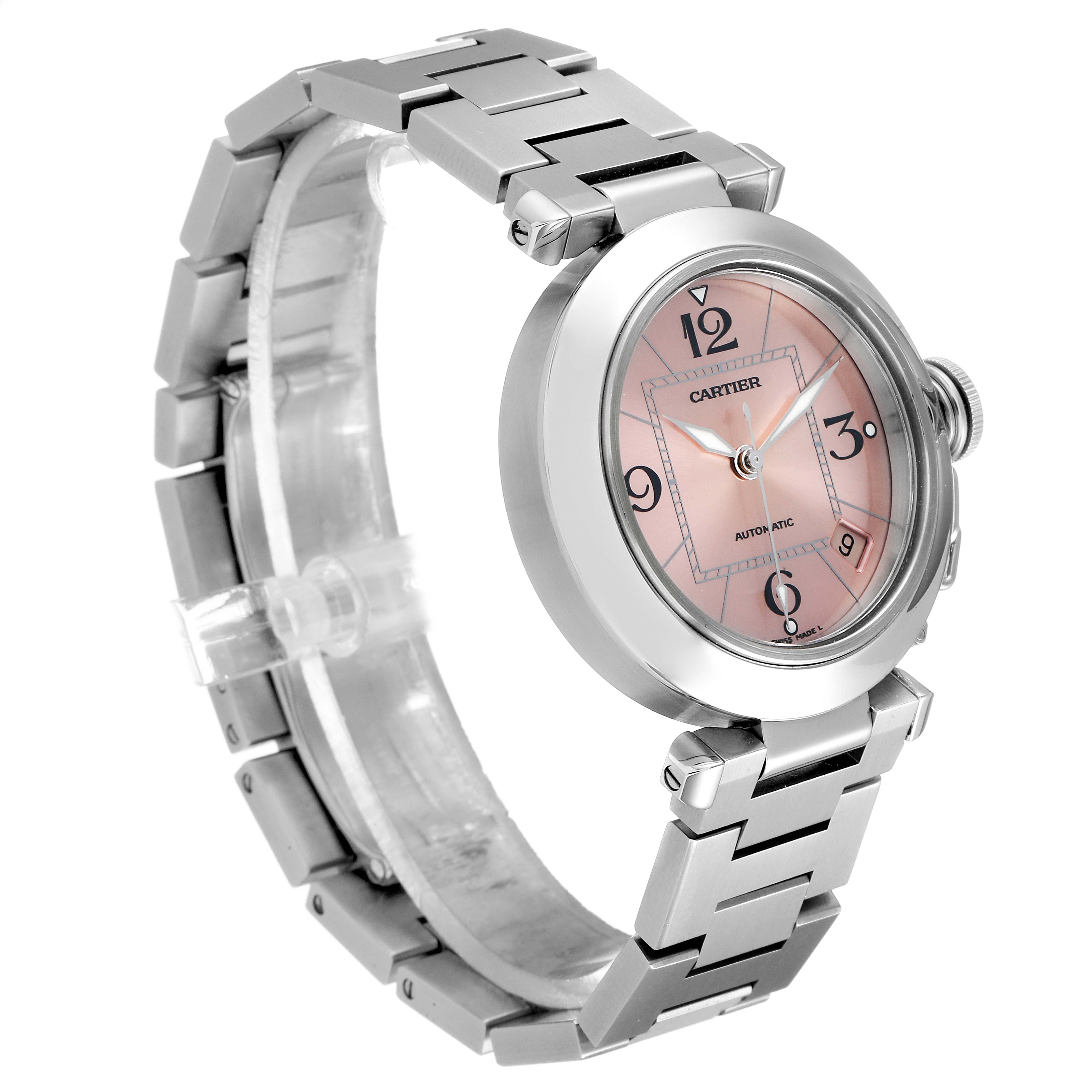 The image shows a Cartier Pasha W31075M7 Women's Stainless Steel Pink Dial W31075M7 Women's Stainless Steel Pink Dial watch at a three-quarter angle, highlighting its bracelet, case, dial, and crown.