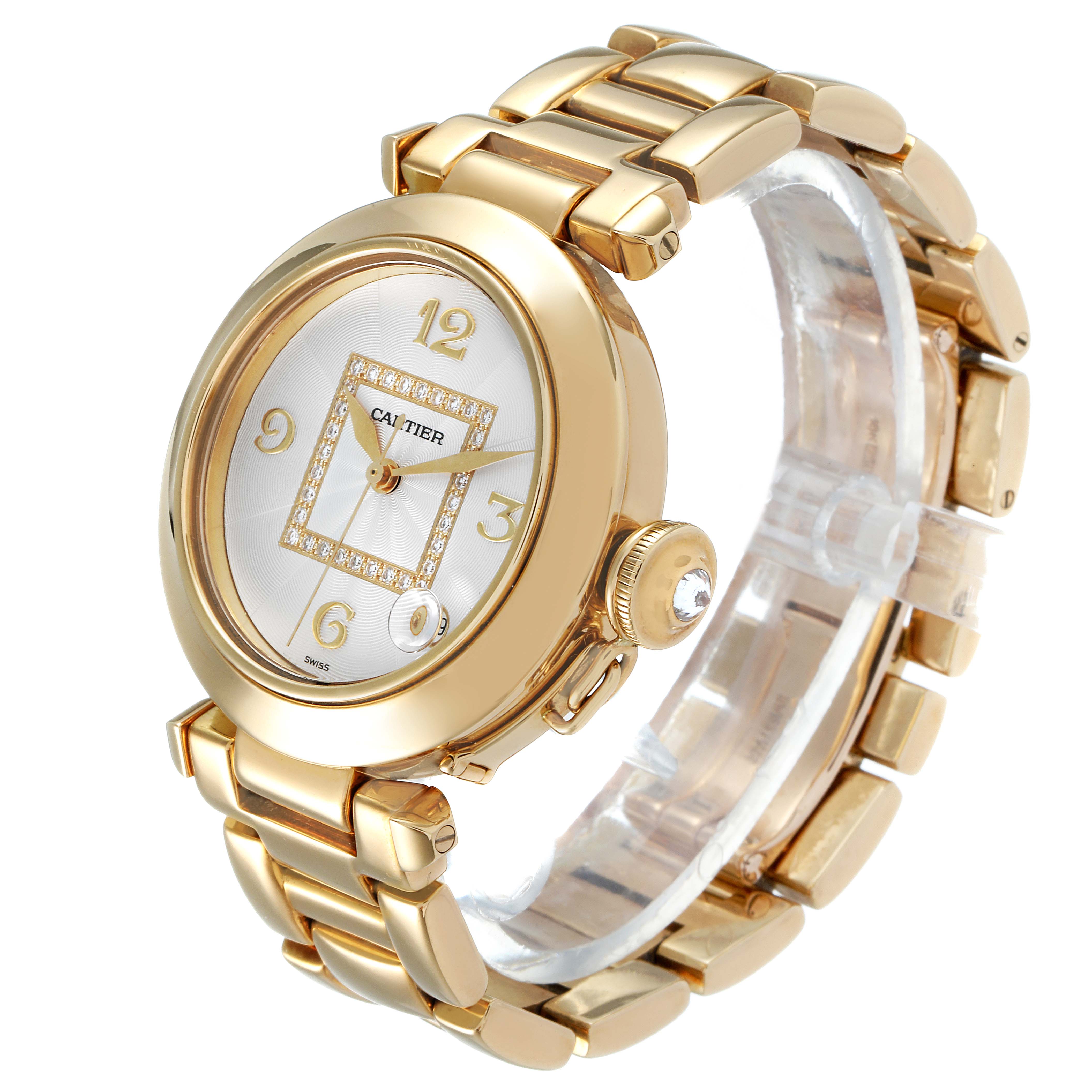 The image shows a Cartier Pasha WJ1110H9 Women's Yellow Gold Silver Dial WJ1110H9 Women's Yellow Gold Silver Dial watch at an angle, highlighting its gold bracelet, round face, and diamond-studded dial.