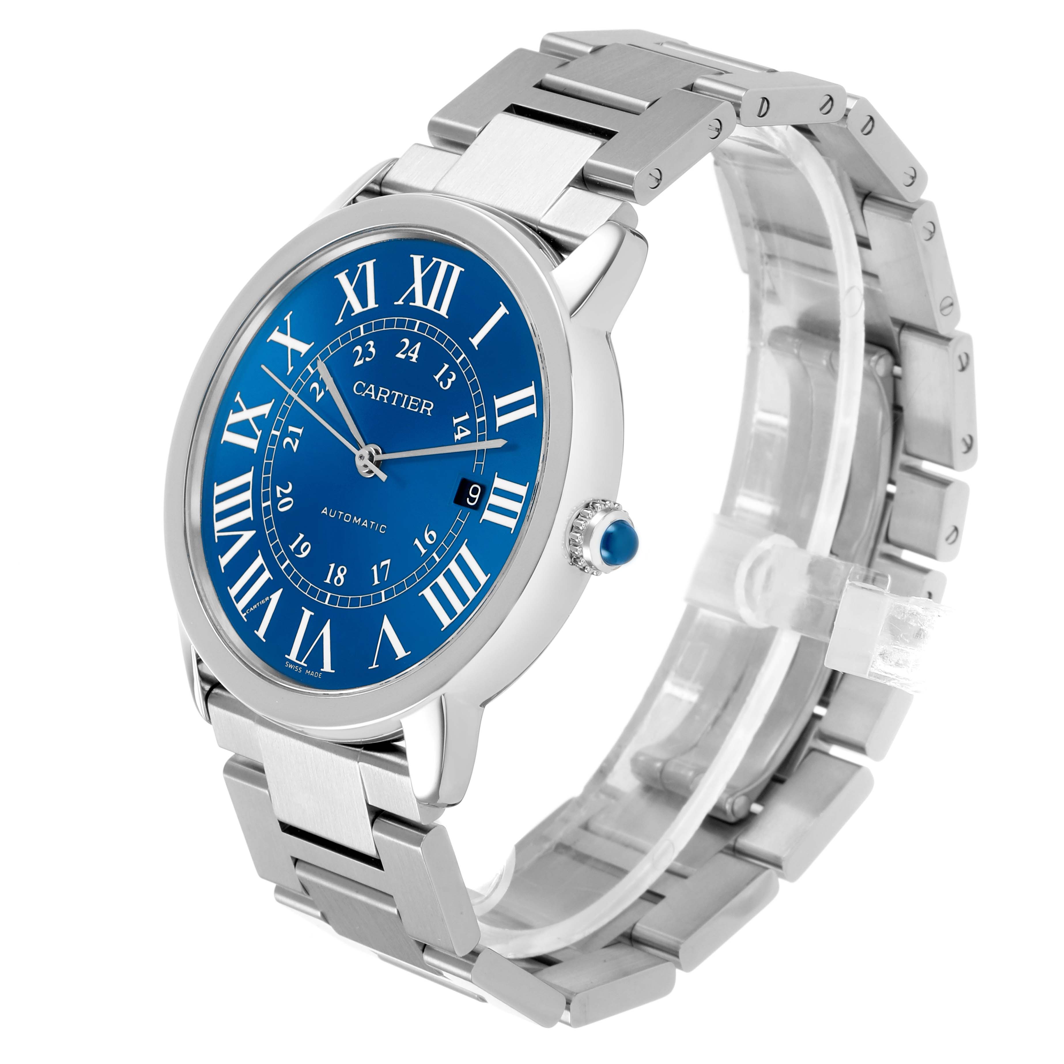 The Cartier Ronde WSRN0023 Men's Stainless Steel Blue Dial watch is shown at a three-quarter angle, highlighting the blue dial, Roman numerals, and metal bracelet.
