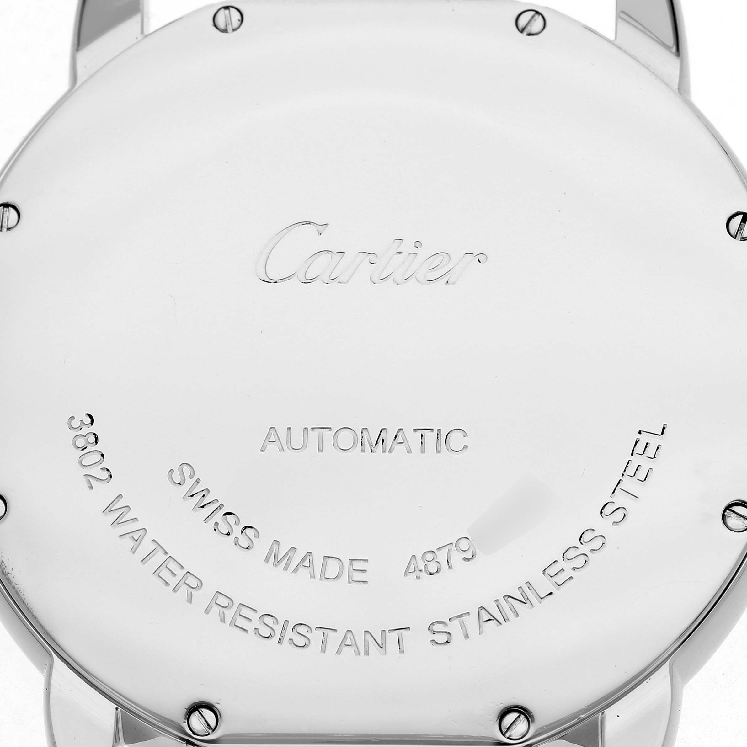 The image shows the case back of a Cartier Ronde WSRN0023 Men's Stainless Steel Blue Dial watch, displaying engravings about its features and origin.