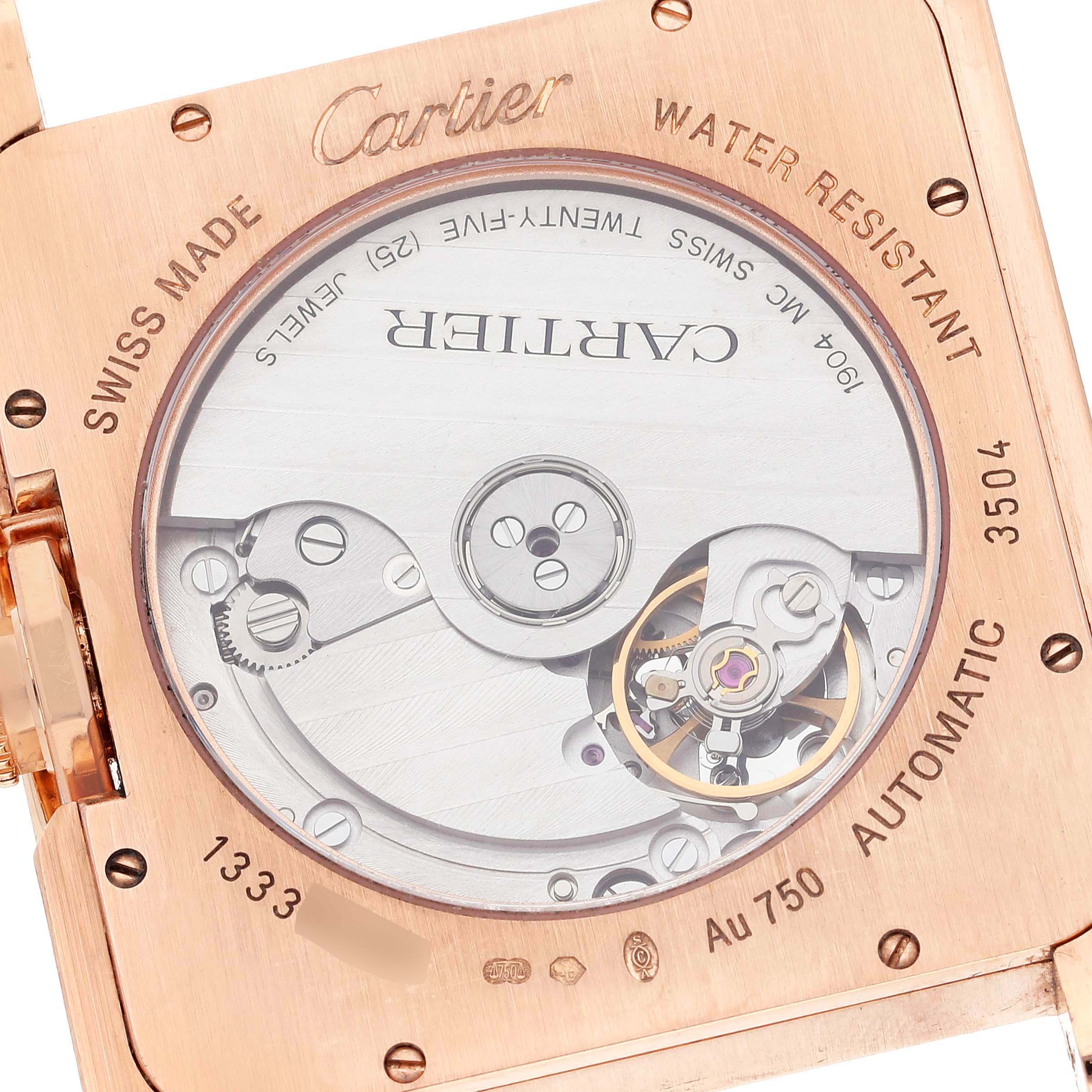 This image shows a close-up of the movement and back casing of a Cartier Tank Anglaise WT100004 Men
s Rose Gold Silver Dial WT100004 Men
s Rose Gold Silver Dial watch.