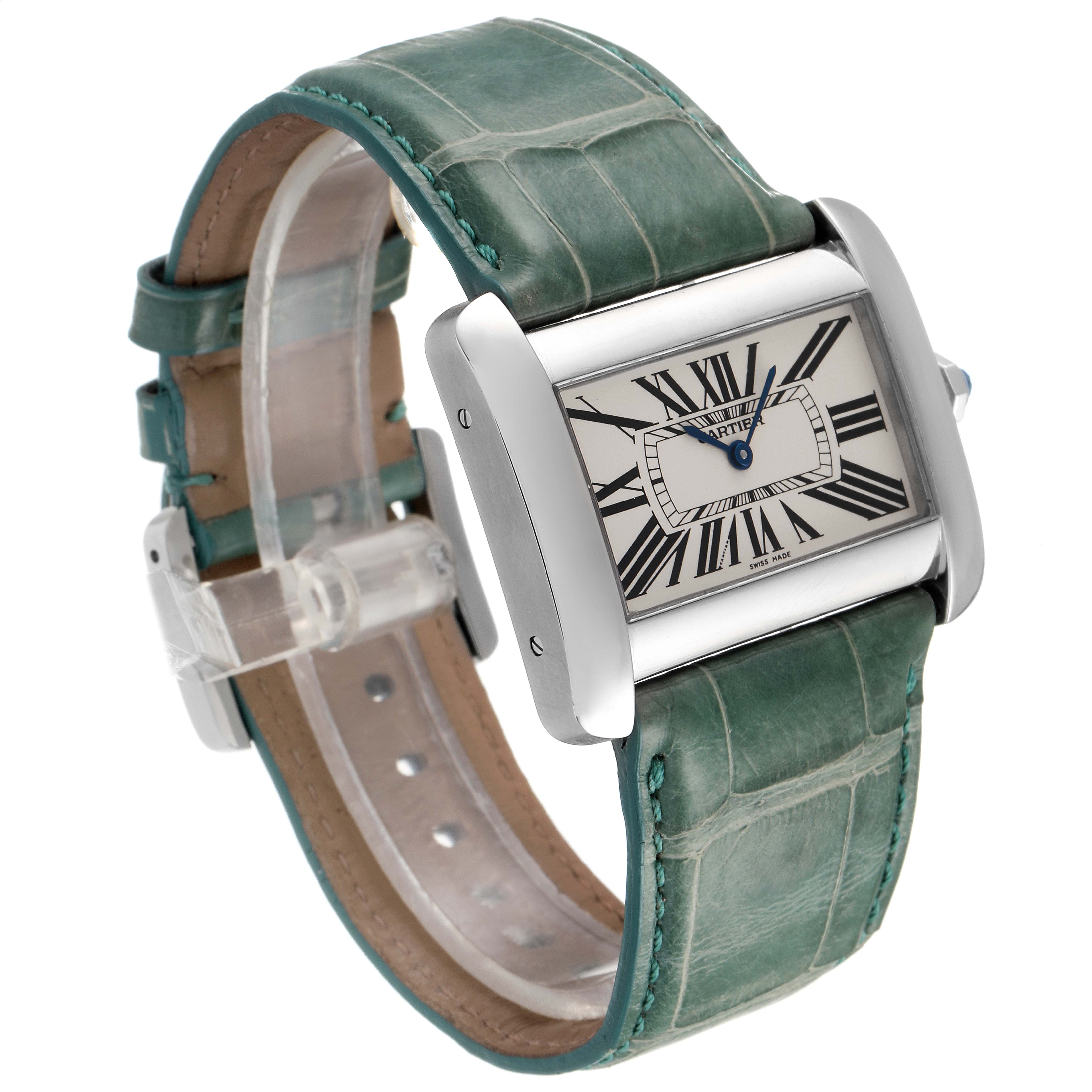 The Cartier Tank Divan W6300755 Men
s Stainless Steel Silver Dial W6300755 Men
s Stainless Steel Silver Dial watch is shown at a three-quarter angle, displaying the rectangular face and green leather strap.