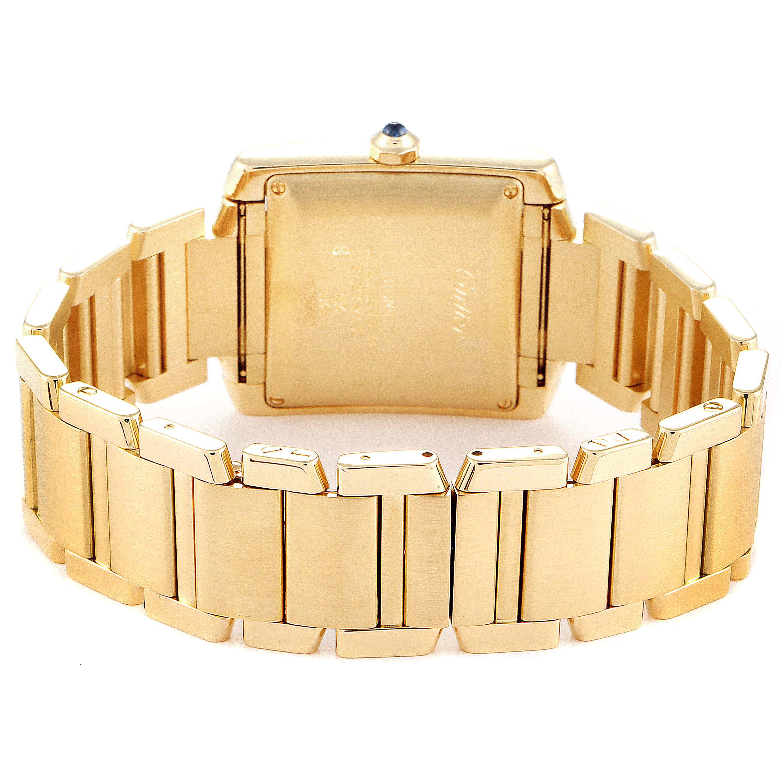 The image shows the back view and bracelet of the Tank Française model by Cartier.