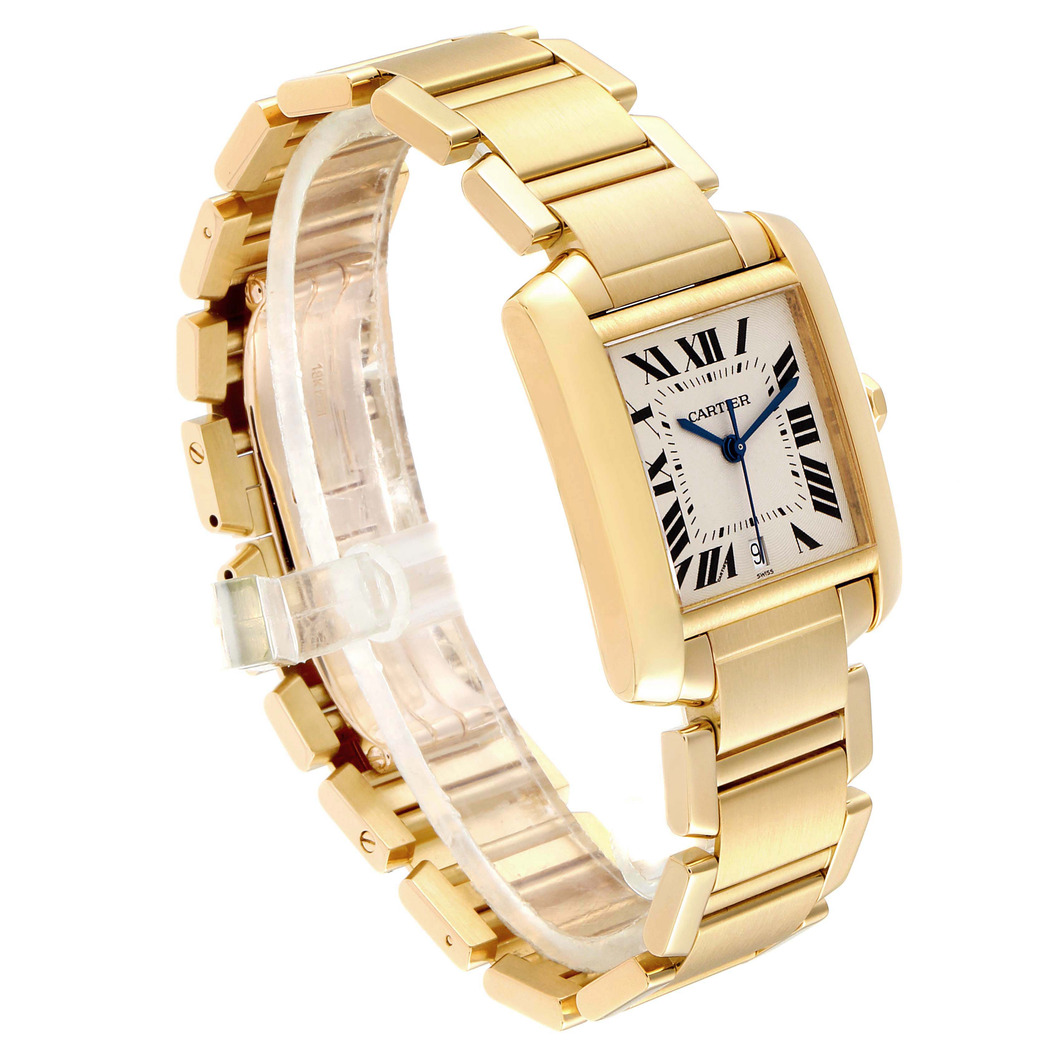 The image shows a Cartier Tank Francaise W50001R2 Men's Yellow Gold Silver Dial W50001R2 Men's Yellow Gold Silver Dial watch at an angled view, highlighting the gold bracelet and rectangular face with Roman numerals.