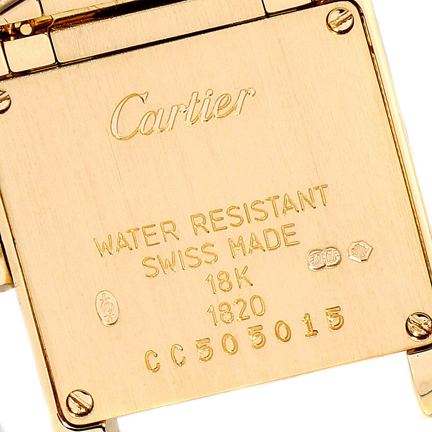 The image shows the back case of a Cartier Tank Francaise W50002N2 Women's Yellow Gold Silver Dial W50002N2 Women's Yellow Gold Silver Dial watch with engravings and markings.