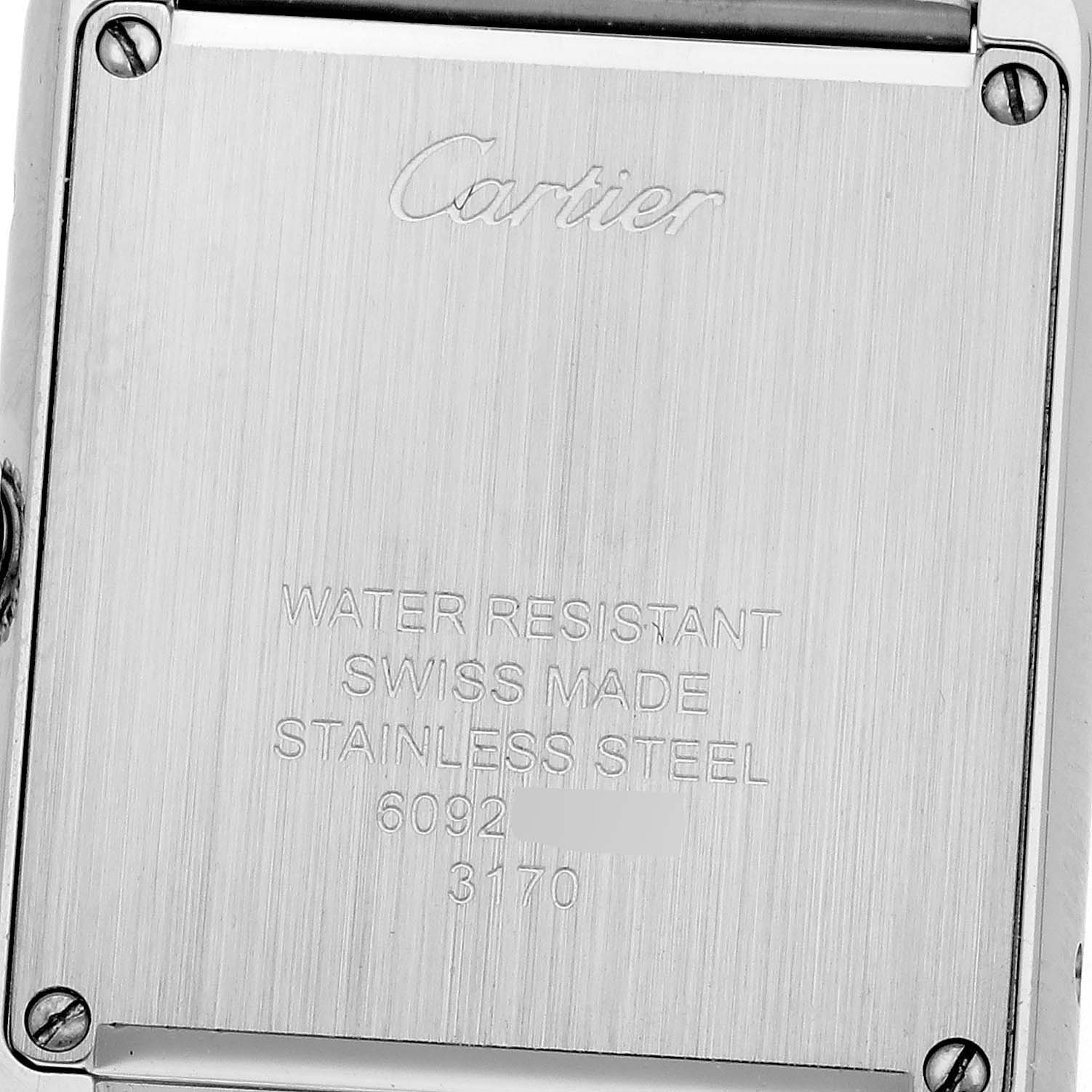 This image shows the back case of the Cartier Tank Solo W5200013 Women's Stainless Steel Silver Dial W5200013 Women's Stainless Steel Silver Dial watch with engraved details.