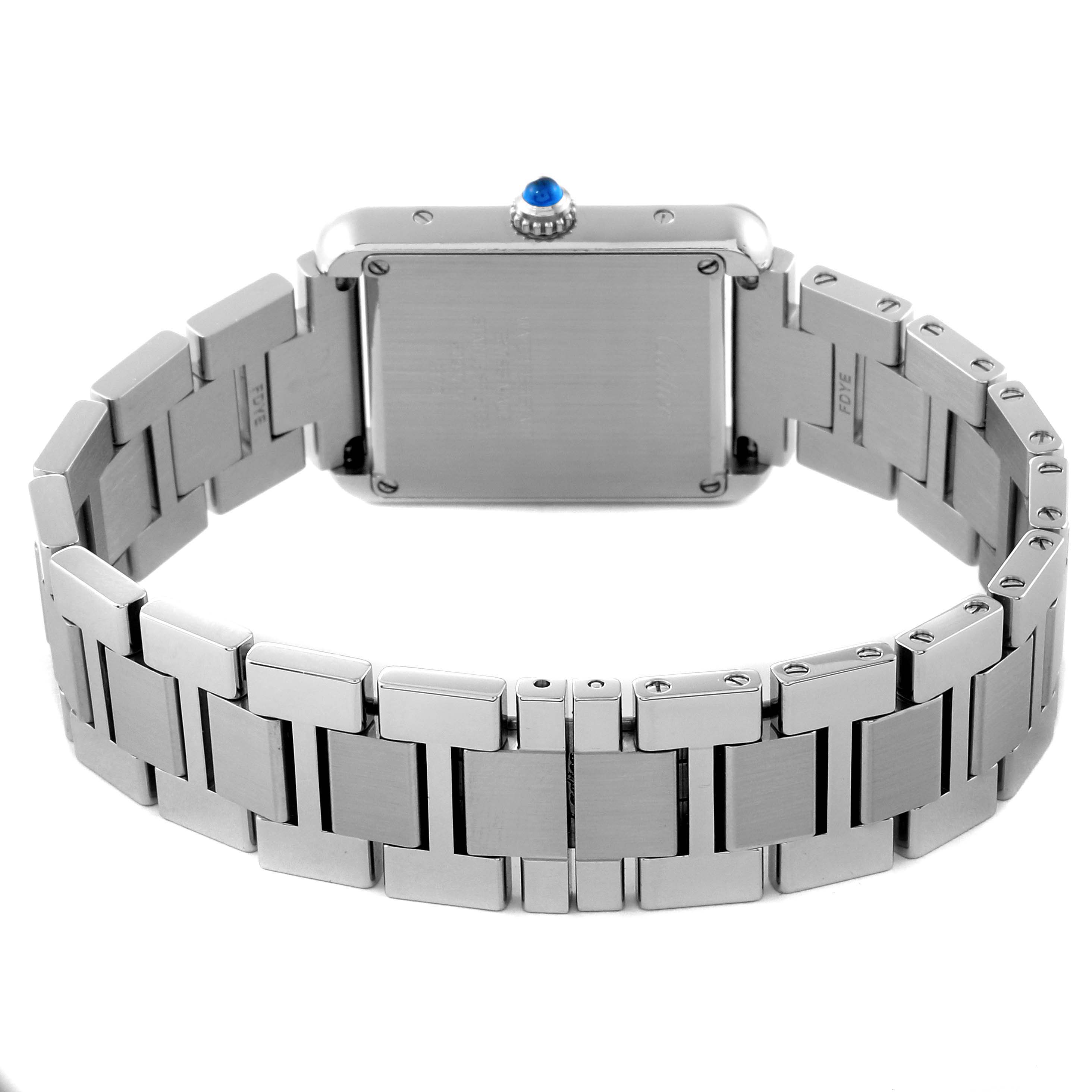 This Cartier Tank Solo W5200013 Women's Stainless Steel Silver Dial W5200013 Women's Stainless Steel Silver Dial watch is shown from the back, highlighting the stainless steel case, bracelet, and crown.