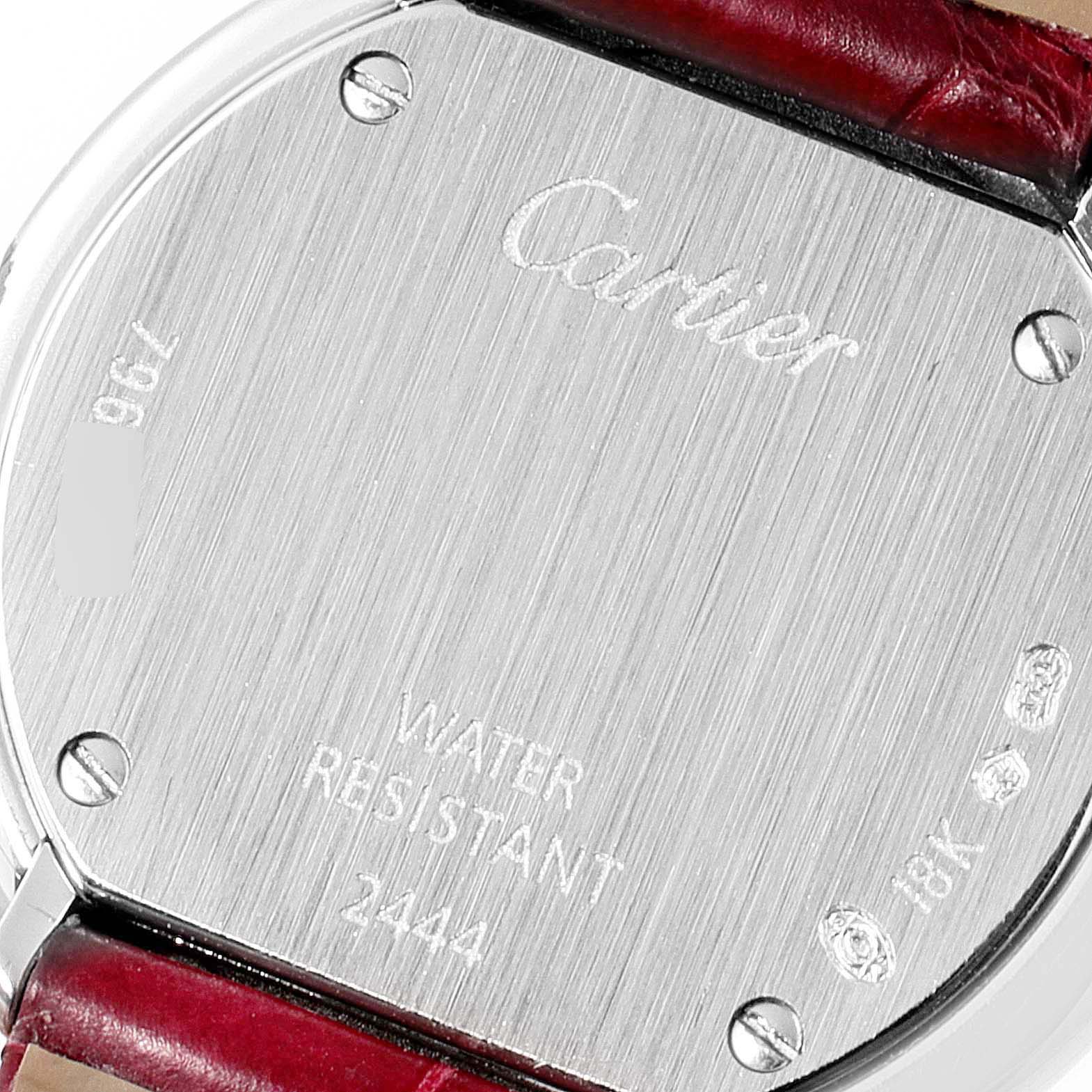The image shows the back of a Cartier Trinity WG200846 Women's White Gold Mother of Pearl Dial watch, featuring the brand engraving and water resistance details.