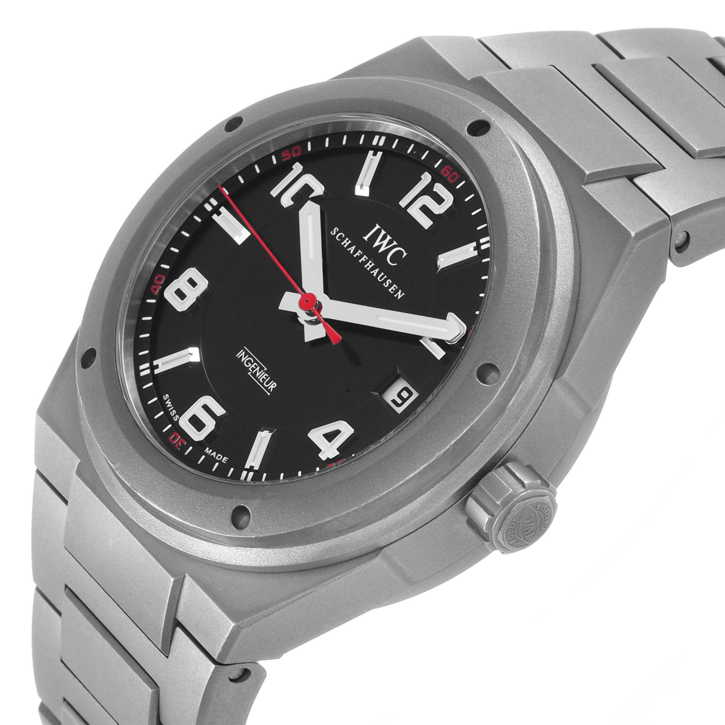 The IWC Ingenieur IW322702 Men's Titanium Black Dial watch is shown at a tilted angle, displaying the face, case, crown, and bracelet.