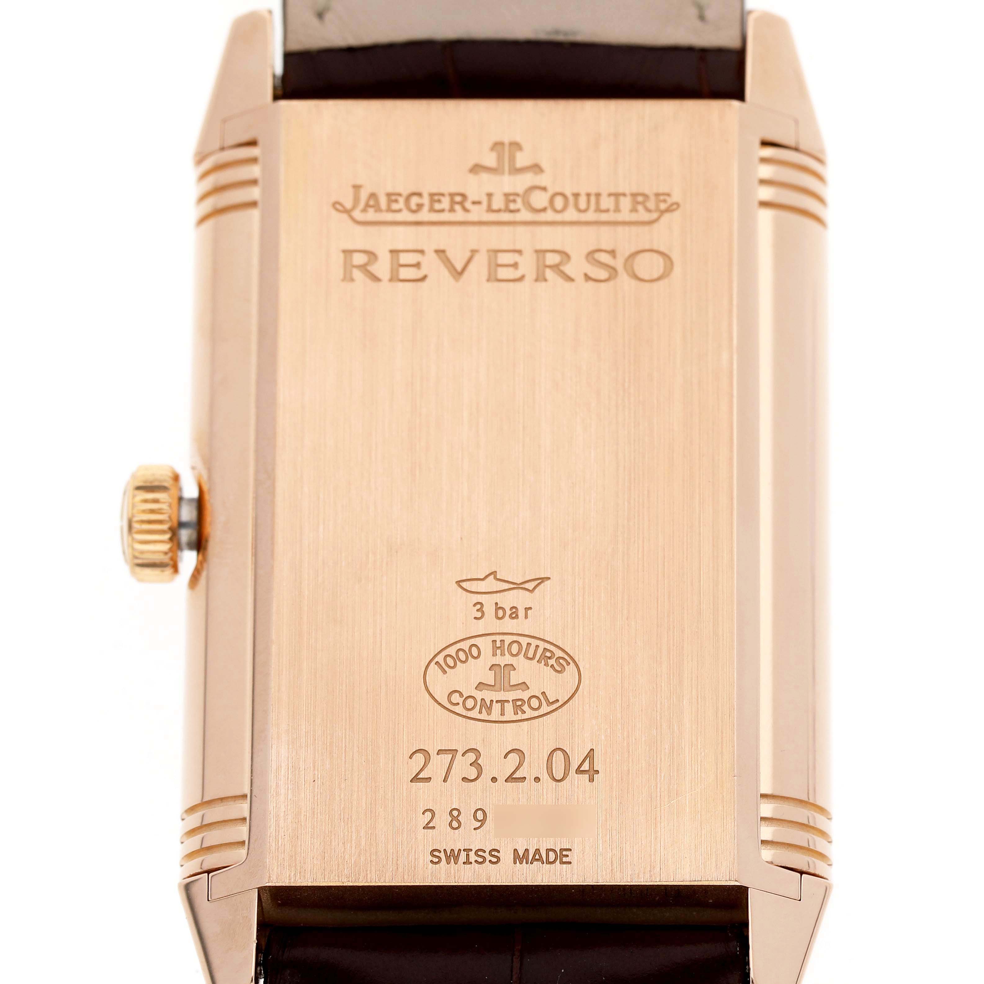 The image shows the back case of a Jaeger LeCoultre Reverso Q3732420 Men's Rose Gold Silver Dial watch, highlighting the logo and model details.