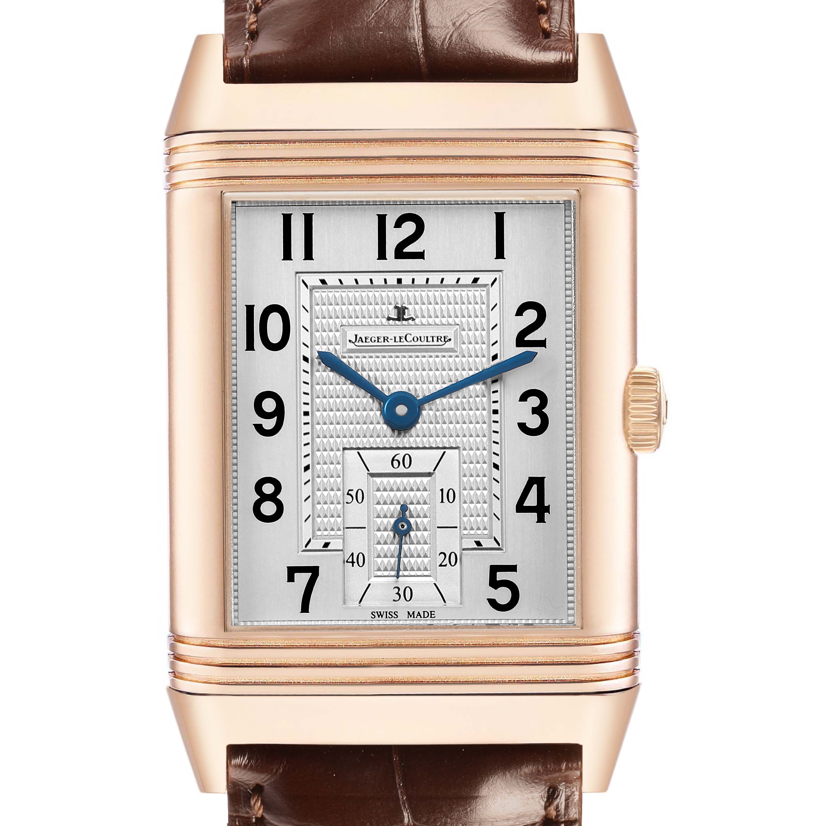 The Jaeger-LeCoultre Reverso watch is shown from a front angle, highlighting the face, dial, and crown.