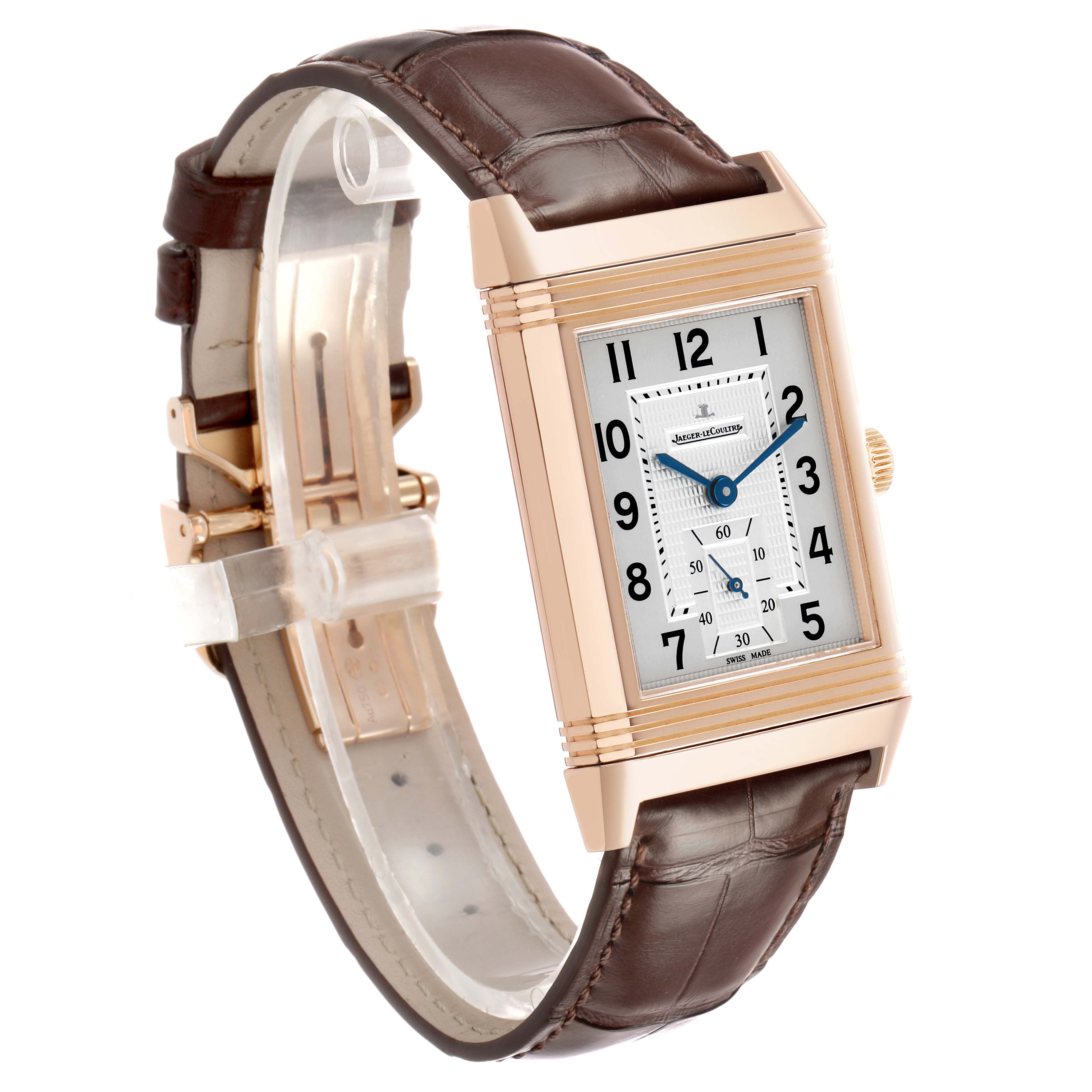The Jaeger-LeCoultre Reverso watch is shown at a three-quarter angle, highlighting the front face, dial, and brown leather strap.