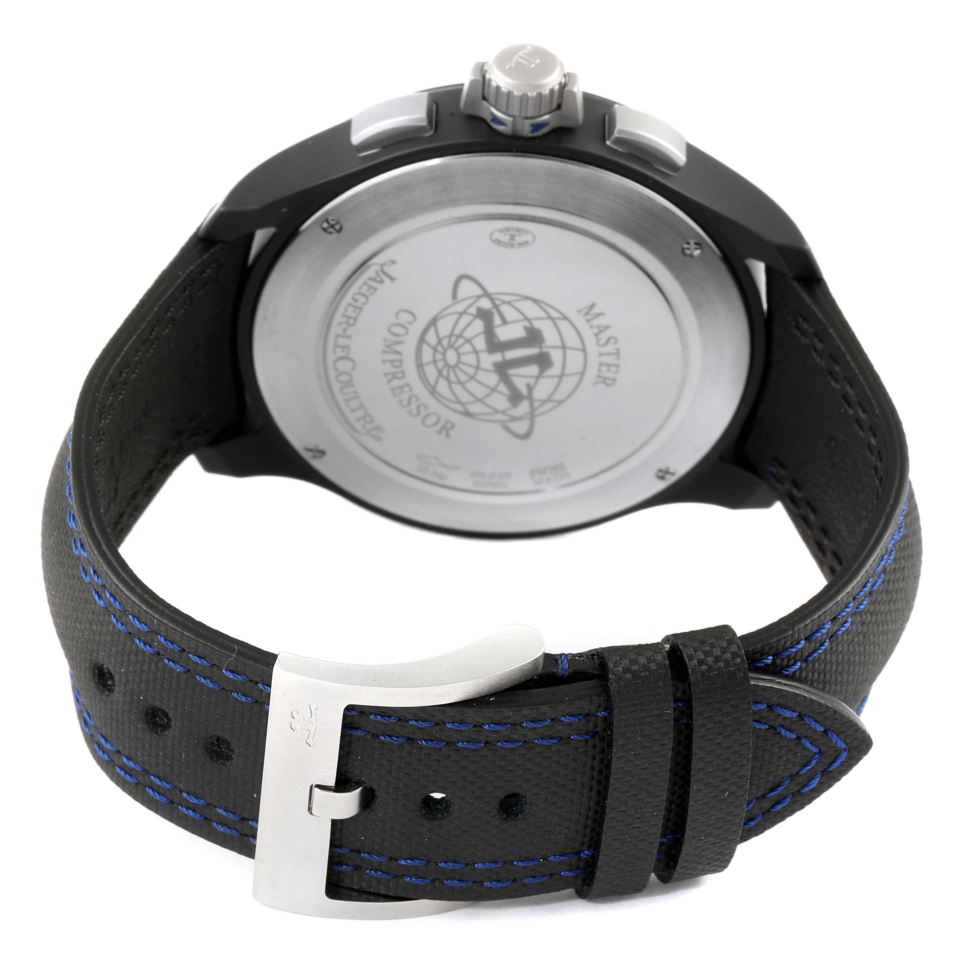 The image shows the back view of a Jaeger-LeCoultre Master Compressor watch, highlighting the case back, crown, and strap with a buckle.