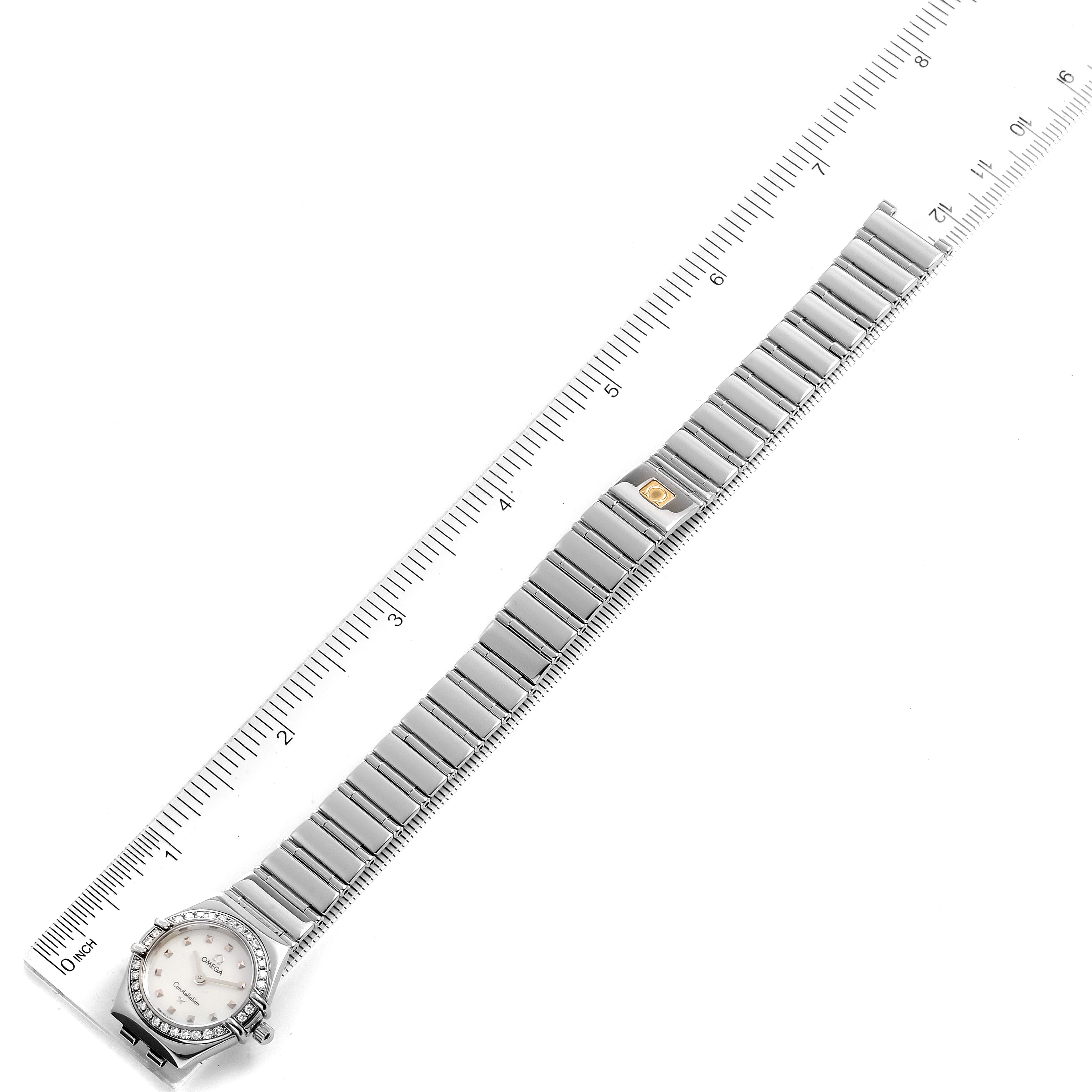 The Omega 1465.71.00 Women
s Stainless Steel Mother of Pearl Dial 1465.71.00 Women
s Stainless Steel Mother of Pearl Dial Constellation My Choice Diamond Steel Ladies Watch 1465.71.00 is shown flat with its bracelet fully extended alongside a ruler.