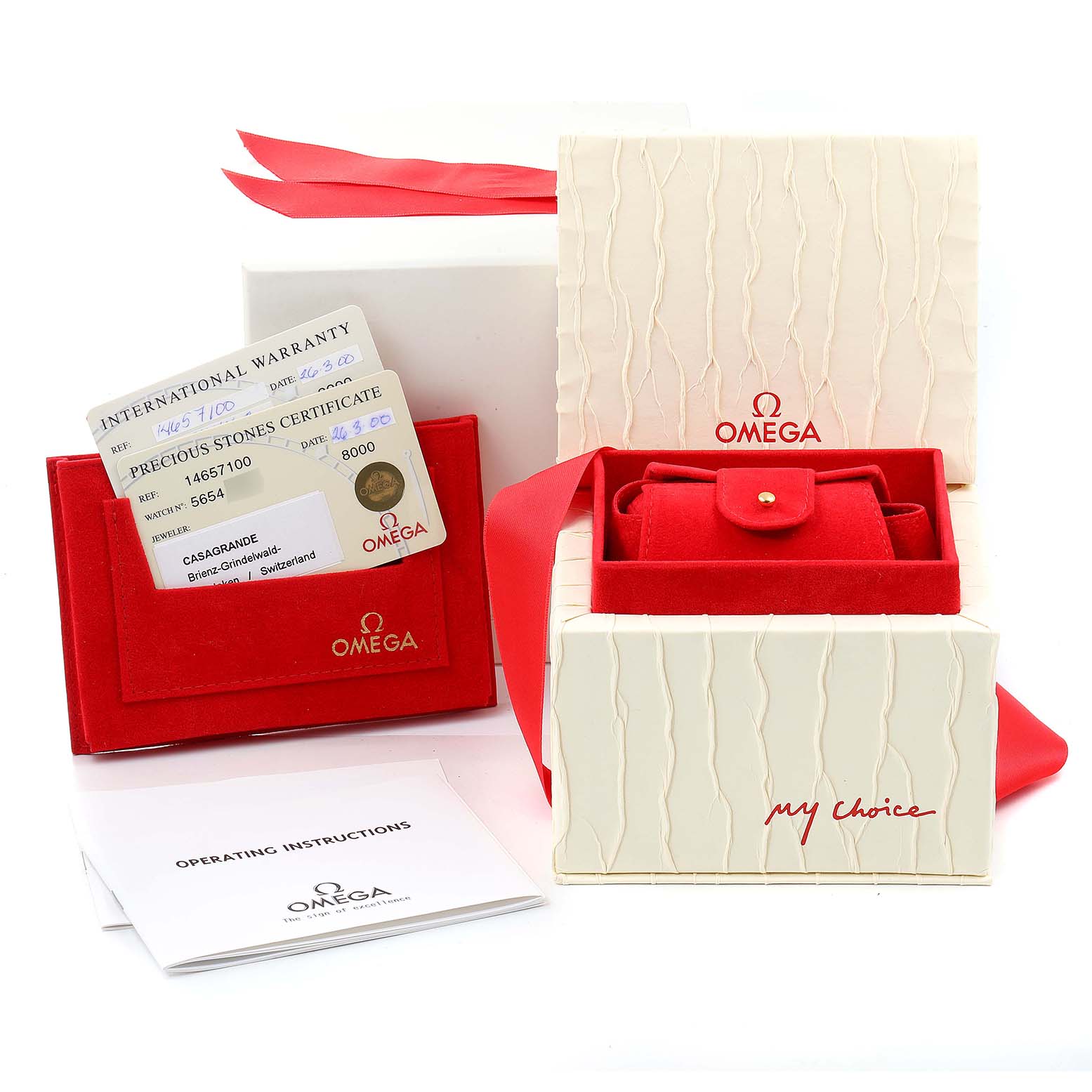 The image shows the packaging, warranty card, certificate, and operating instructions for the Omega 1465.71.00 Women
s Stainless Steel Mother of Pearl Dial 1465.71.00 Women
s Stainless Steel Mother of Pearl Dial Constellation My Choice Diamond Steel Ladies Watch 1465.71.00.