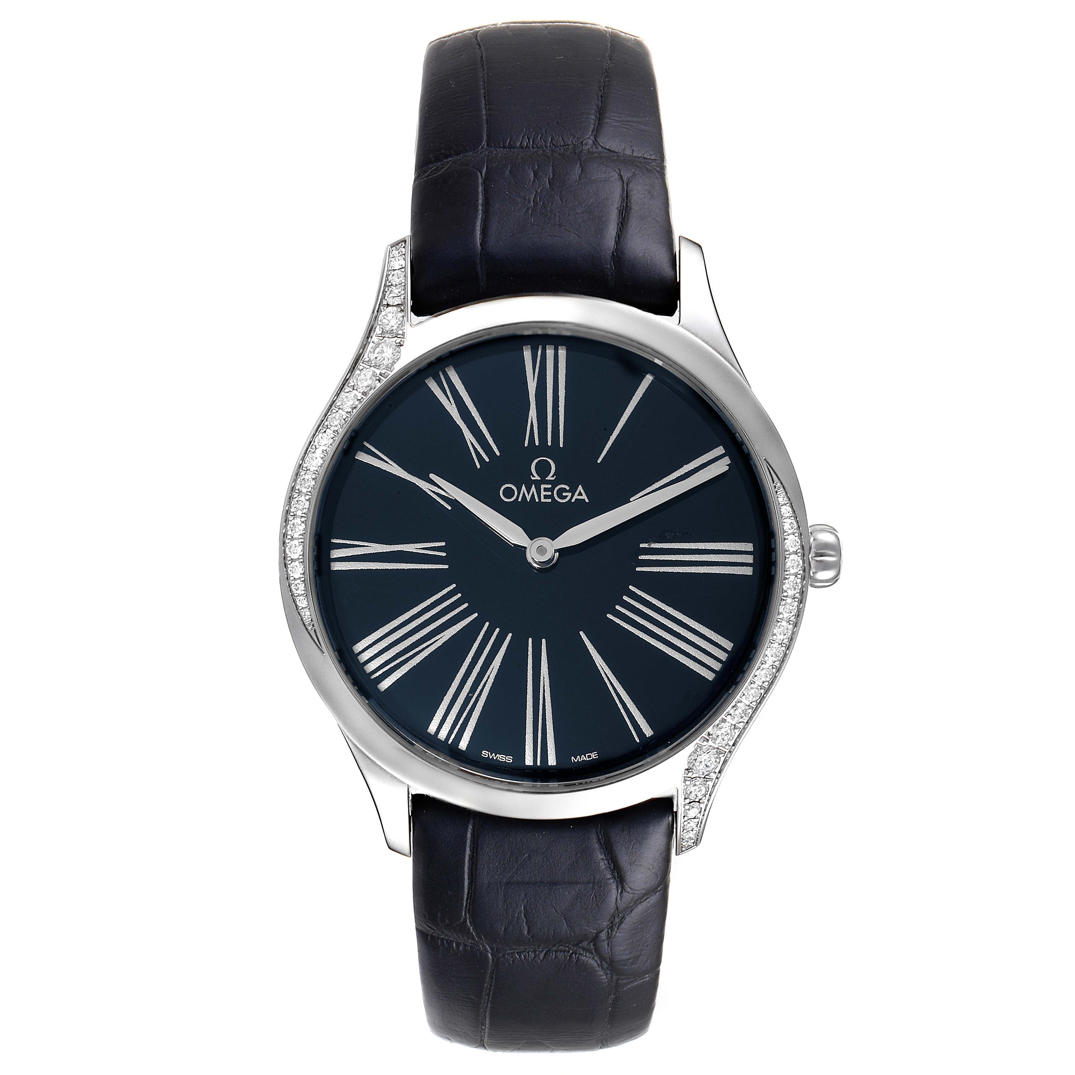 The Omega 428.18.36.60.03.001 Women's Stainless Steel Blue Dial 428.18.36.60.03.001 Women's Stainless Steel Blue Dial De Ville Tresor model 428.18.36.60.03.001 watch is shown from a top-down angle, highlighting its blue dial, diamond accents, and leather strap.