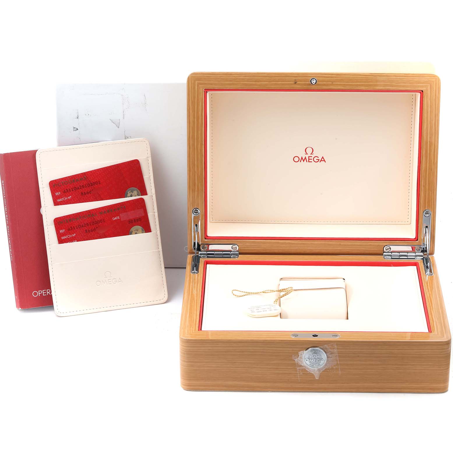 This image shows an open wooden Omega De Ville 431.10.42.51.02.001 Men's Stainless Steel Silver Dial 431.10.42.51.02.001 Men's Stainless Steel Silver Dial watch box, documentation, and warranty cards.