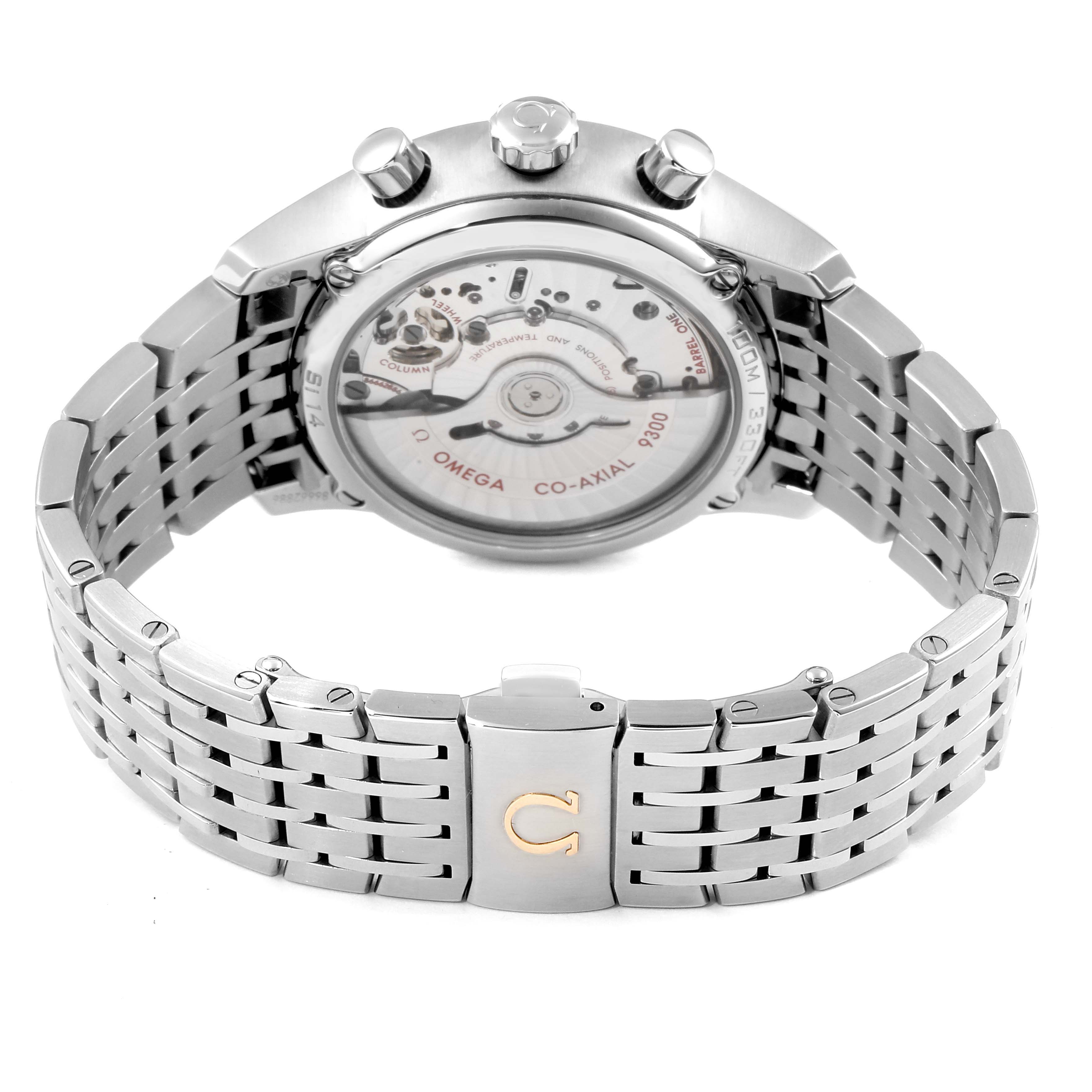 The image shows the back view of the Omega De Ville 431.10.42.51.02.001 Men's Stainless Steel Silver Dial 431.10.42.51.02.001 Men's Stainless Steel Silver Dial watch, displaying its movement, crown, pushers, and bracelet.