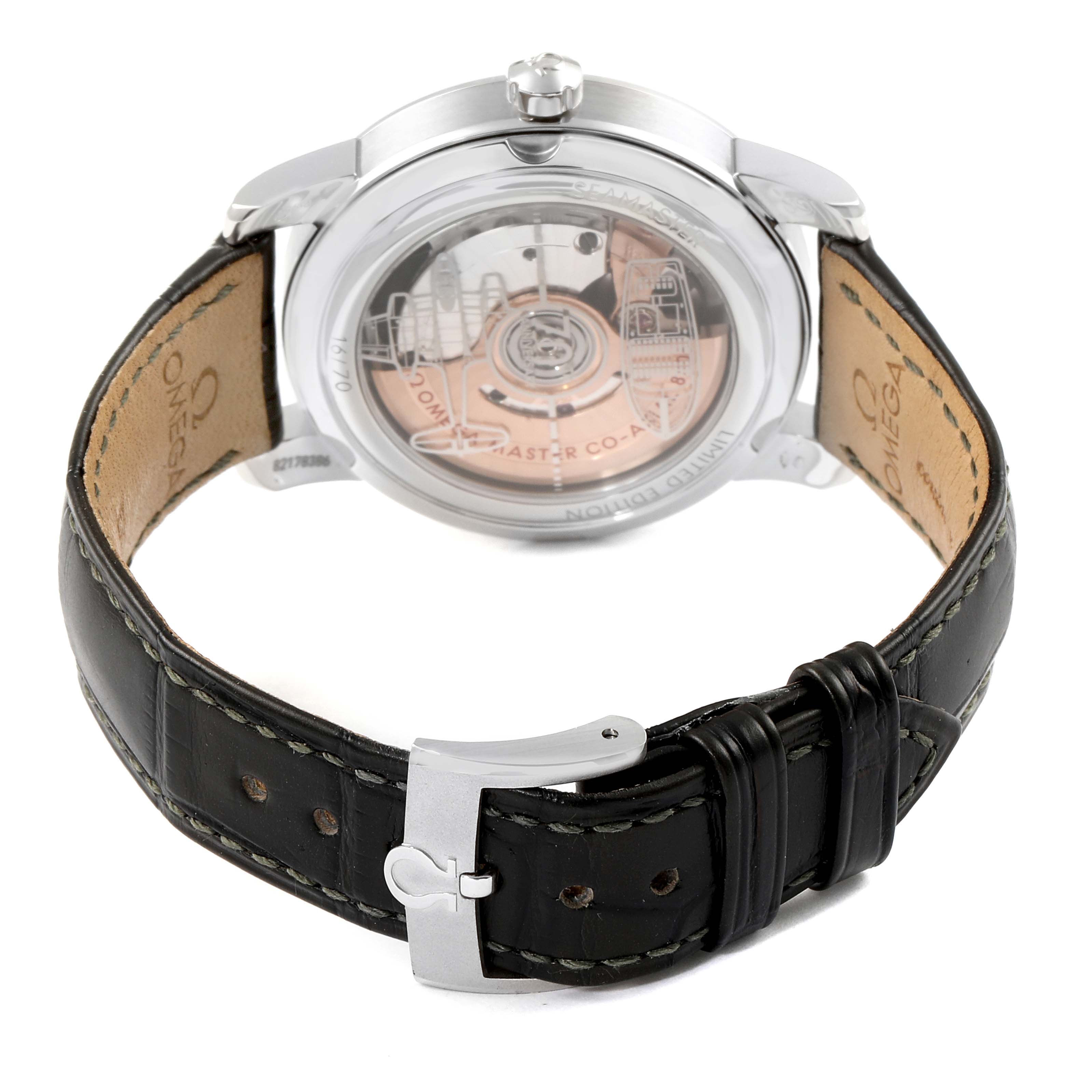 This Omega Museum 511.93.38.20.99.001 Men's Platinum Silver Dial 511.93.38.20.99.001 Men's Platinum Silver Dial model watch is shown from the back, highlighting its transparent case and black leather strap with a clasp.