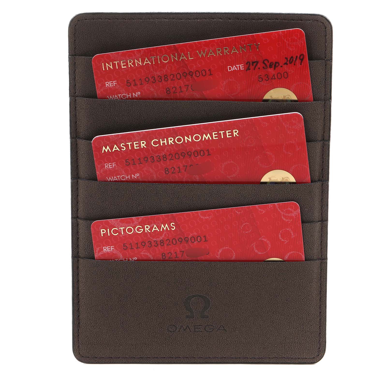 This image shows warranty, chronometer, and pictogram cards for an Omega Museum 511.93.38.20.99.001 Men's Platinum Silver Dial 511.93.38.20.99.001 Men's Platinum Silver Dial model watch in a leather cardholder.