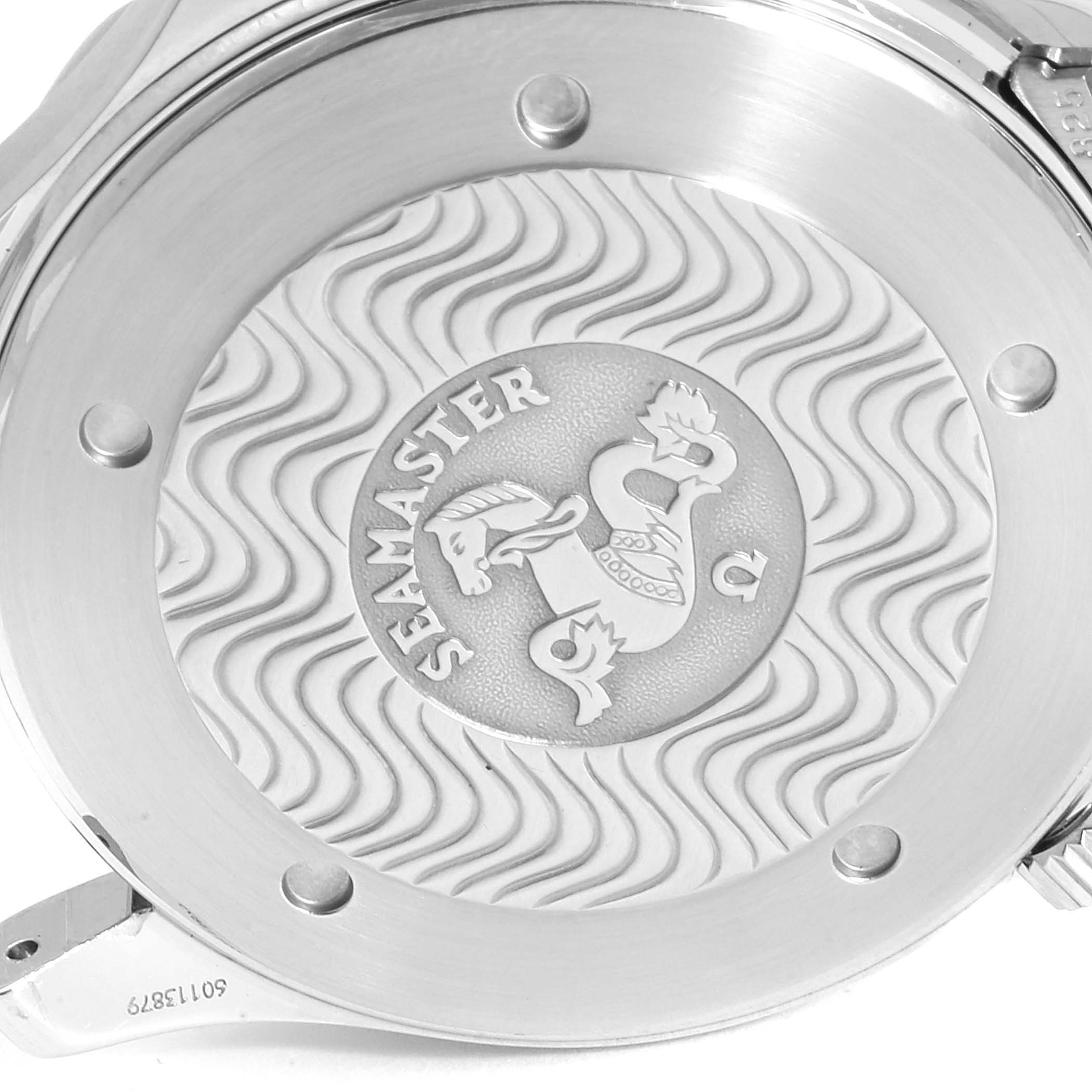 The image shows the caseback of an Omega Seamaster 2531.80.00 Men
s Stainless Steel Blue Dial 2531.80.00 Men
s Stainless Steel Blue Dial watch with the signature wavy pattern and embossed logo.