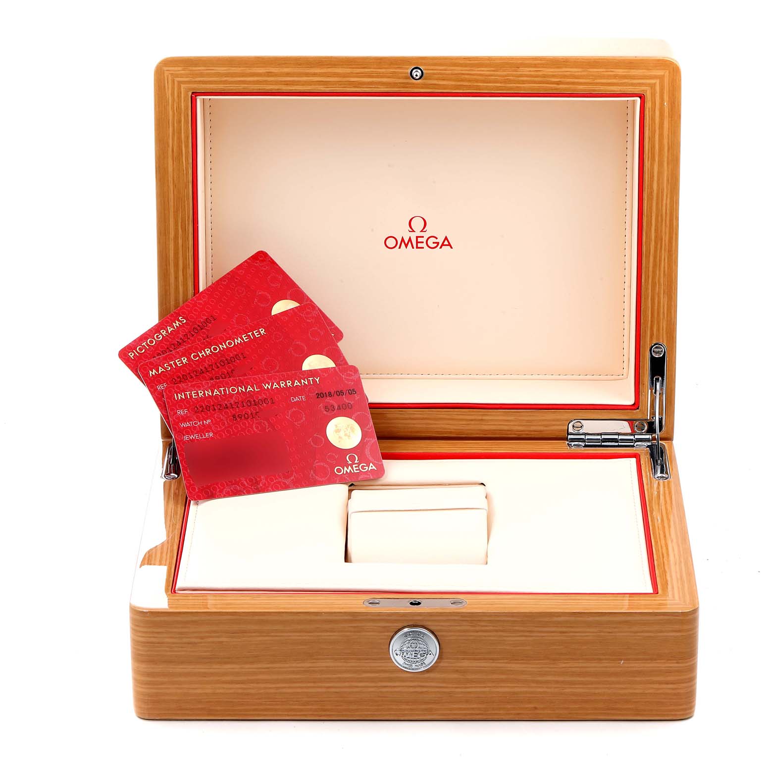 This image shows the packaging and warranty cards for an Omega Aqua Terra 220.12.41.21.01.001 Men's Stainless Steel Black Dial 220.12.41.21.01.001 Men's Stainless Steel Black Dial watch, with the box open.