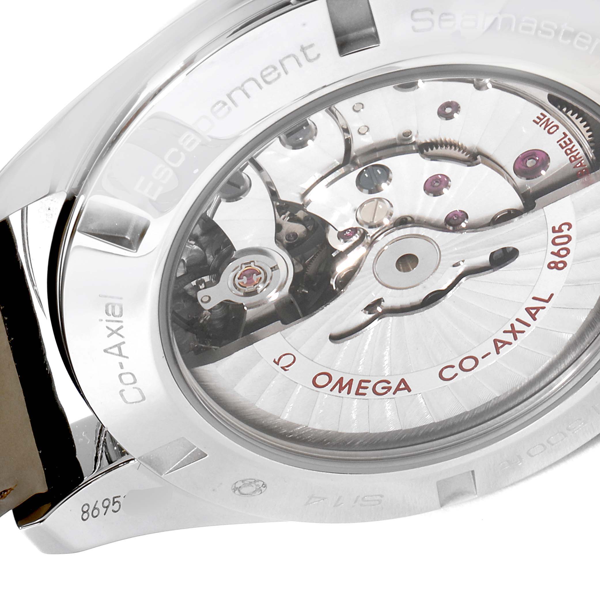 The image shows the back of the Omega Aqua Terra 231.13.43.22.01.001 Men's Stainless Steel Black Dial 231.13.43.22.01.001 Men's Stainless Steel Black Dial watch, highlighting the movement and co-axial escapement.