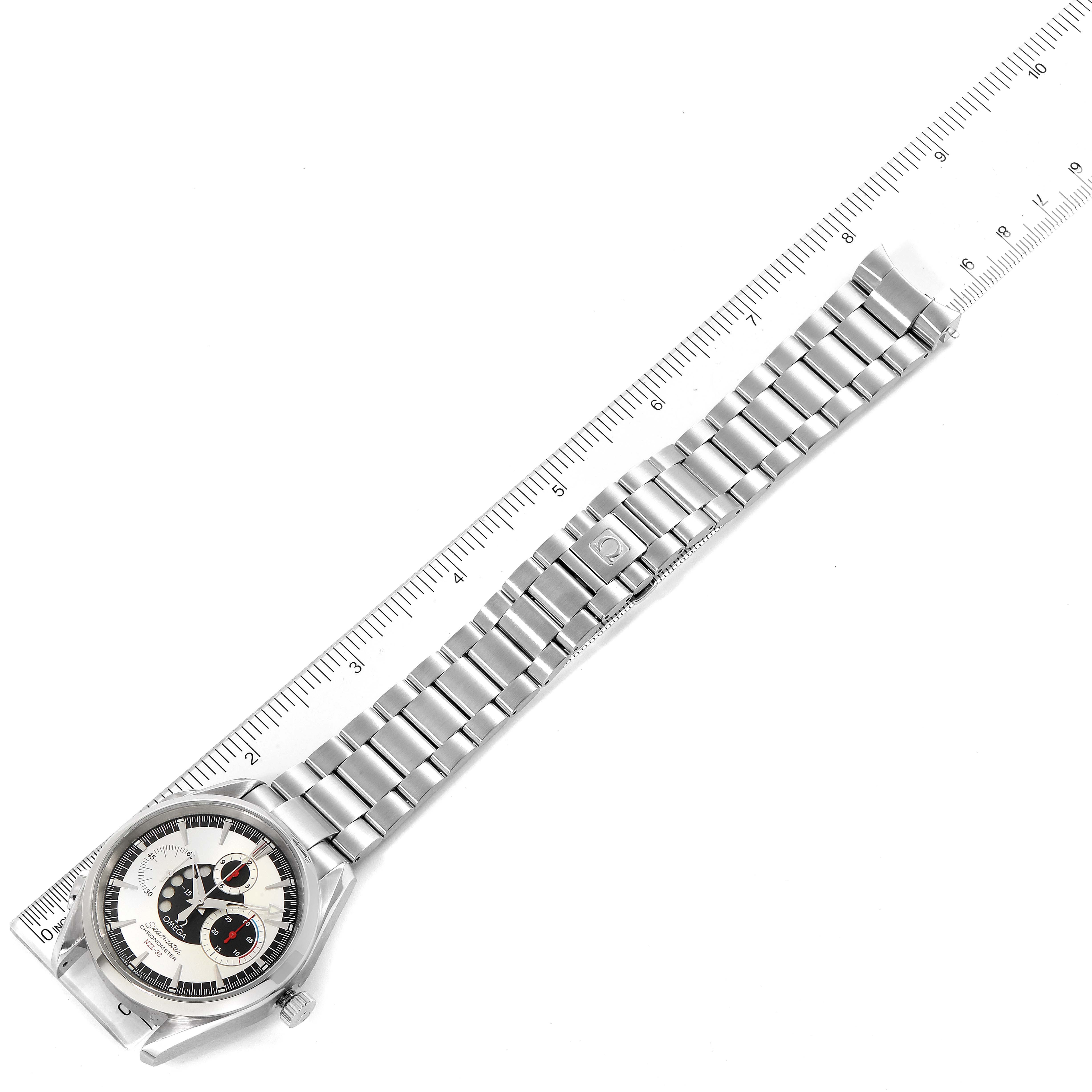 This image shows an Omega Aqua Terra 2513.30.00 Men
s Stainless Steel Silver Dial 2513.30.00 Men
s Stainless Steel Silver Dial watch laid flat with its full metal bracelet and clasp, aligned next to a ruler for scale.