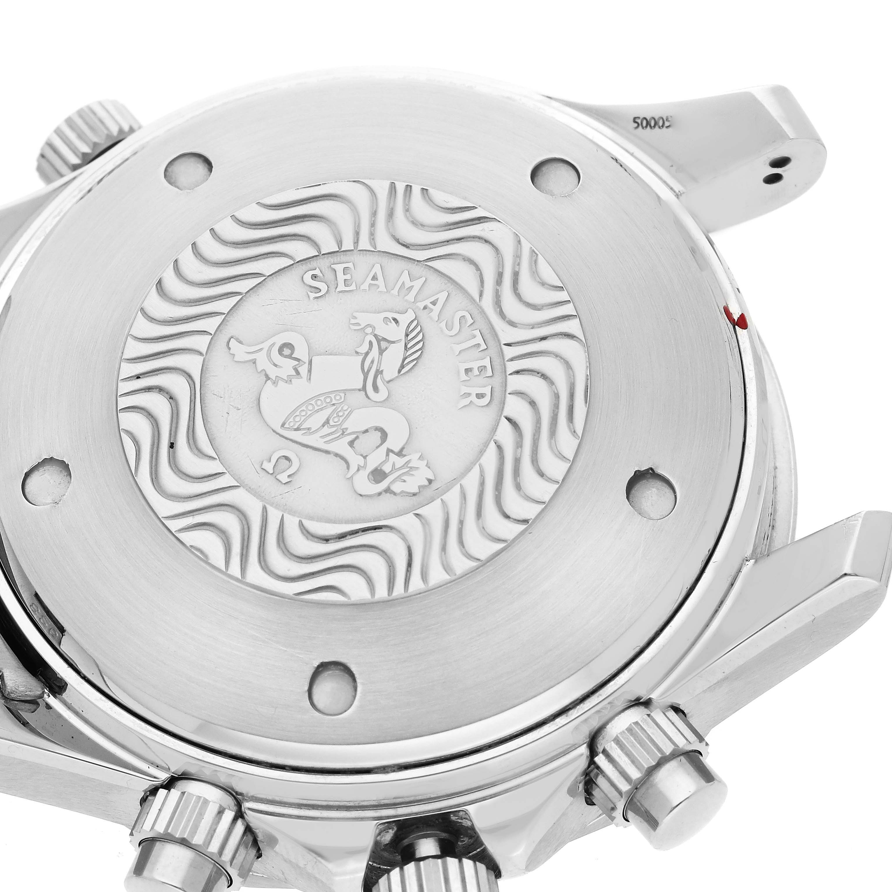 The image shows the back case of an Omega Seamaster 2599.80.00 Men's Stainless Steel Blue Dial 2599.80.00 Men's Stainless Steel Blue Dial watch, featuring the engraved logo and surrounding wave pattern.