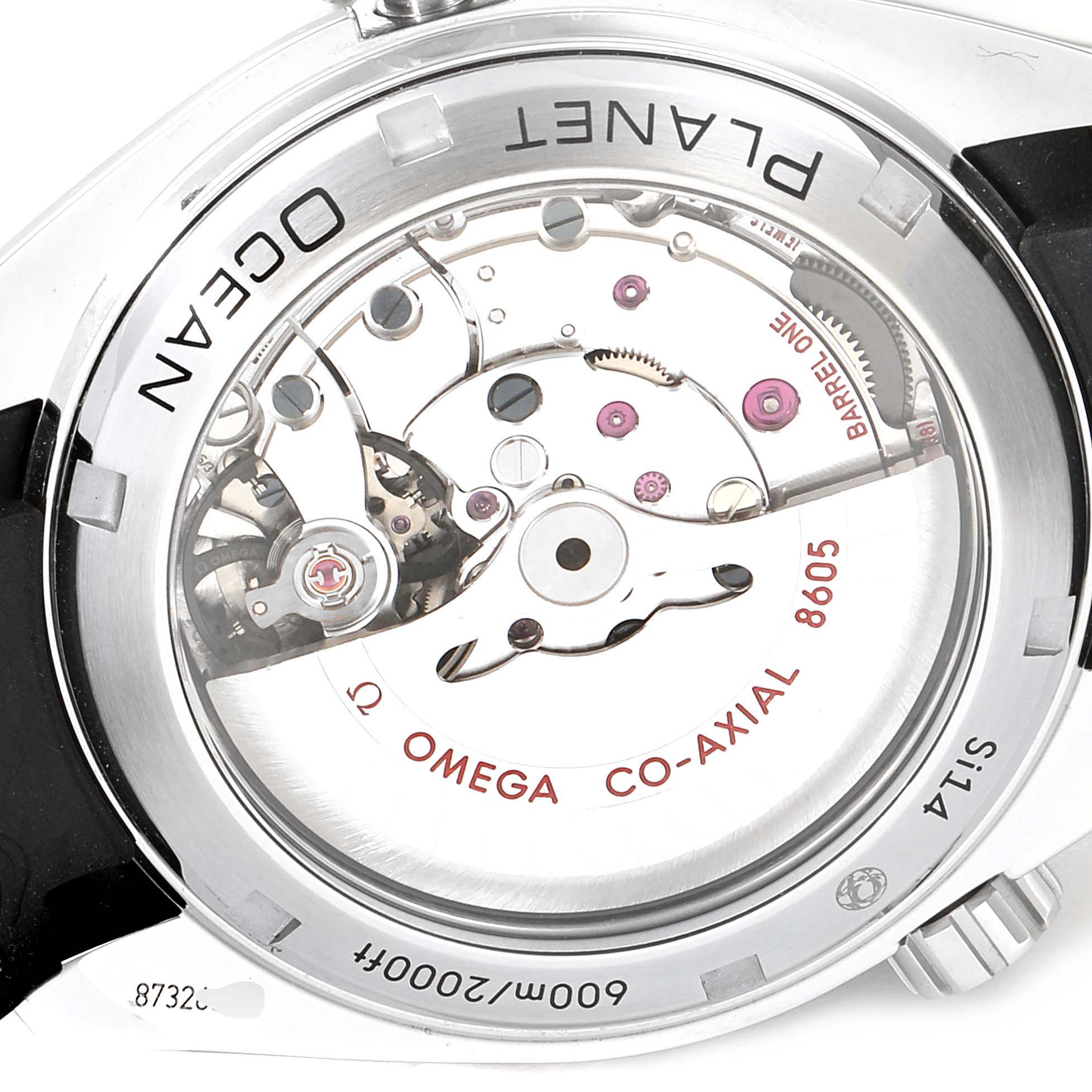 The image shows the backside view of an Omega Seamaster 232.32.44.22.01.002 Men
s Stainless Steel Black Dial 232.32.44.22.01.002 Men
s Stainless Steel Black Dial watch, revealing its Co-Axial 8605 movement.