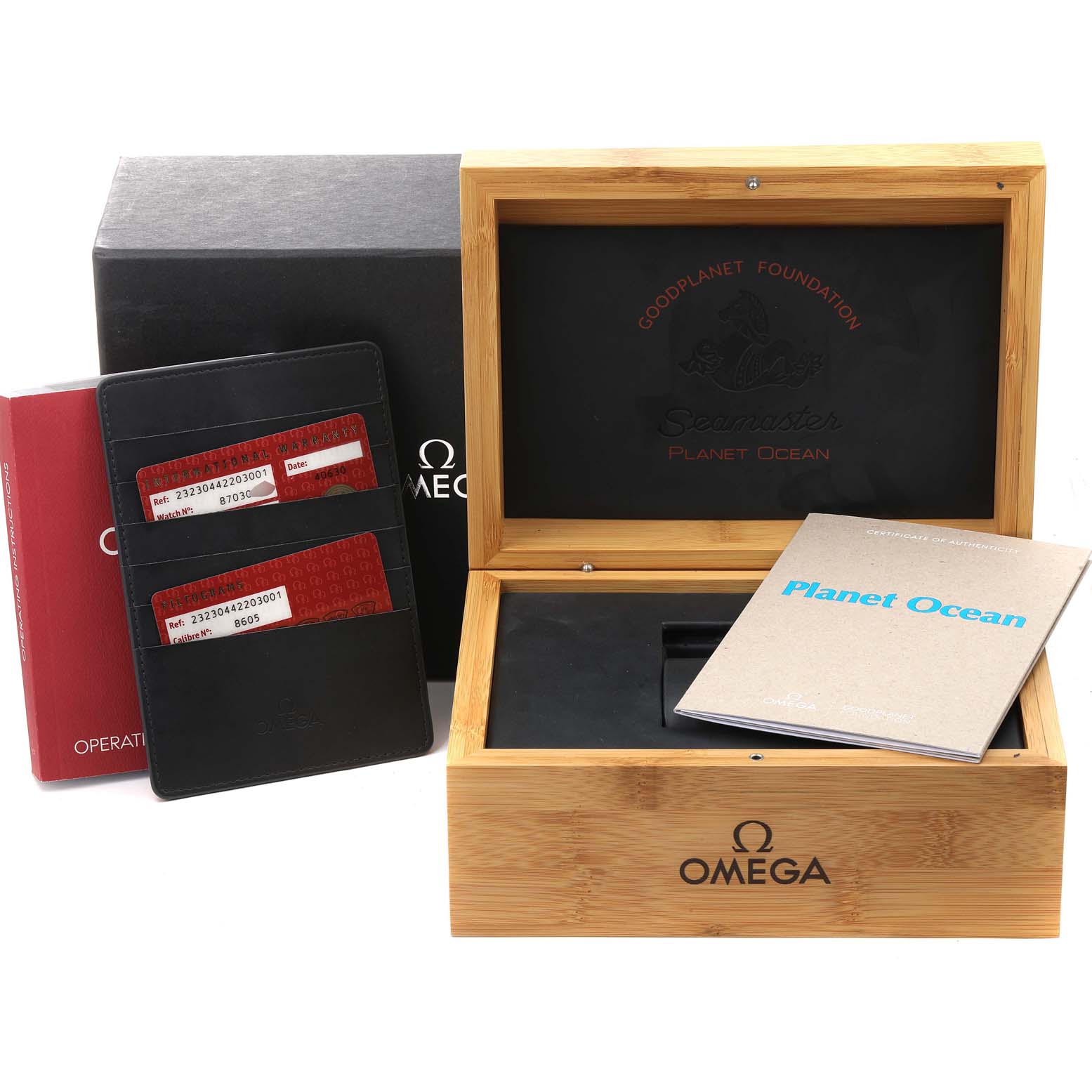 The image shows an Omega Seamaster 232.30.44.22.03.001 Men
s Stainless Steel Blue Dial 232.30.44.22.03.001 Men
s Stainless Steel Blue Dial watch
s wooden box, operation manual, and warranty cards, displayed from a front angle.