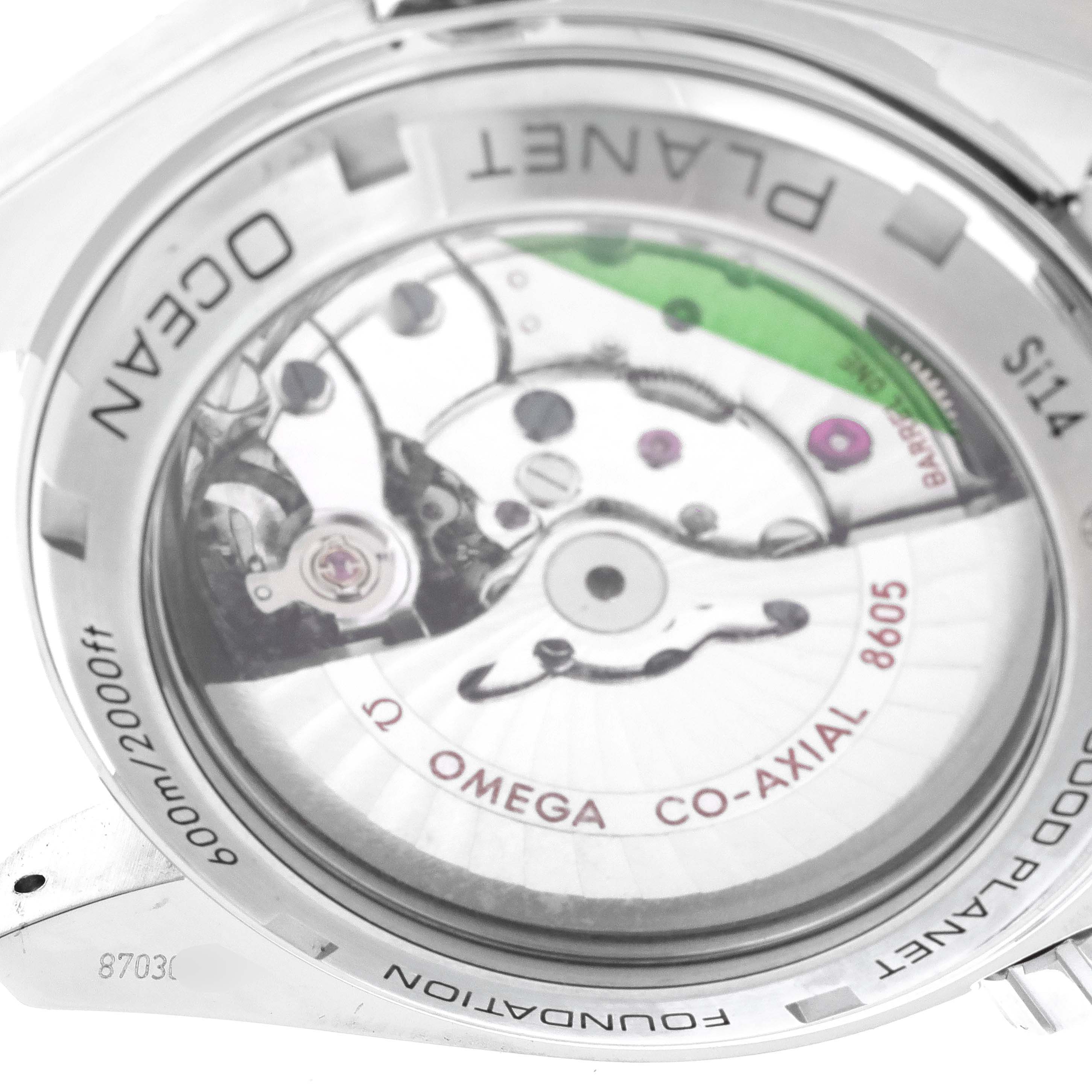 This is the back view of the Omega Seamaster 232.30.44.22.03.001 Men
s Stainless Steel Blue Dial 232.30.44.22.03.001 Men
s Stainless Steel Blue Dial watch, showing its internal mechanism and movement details through a transparent caseback.